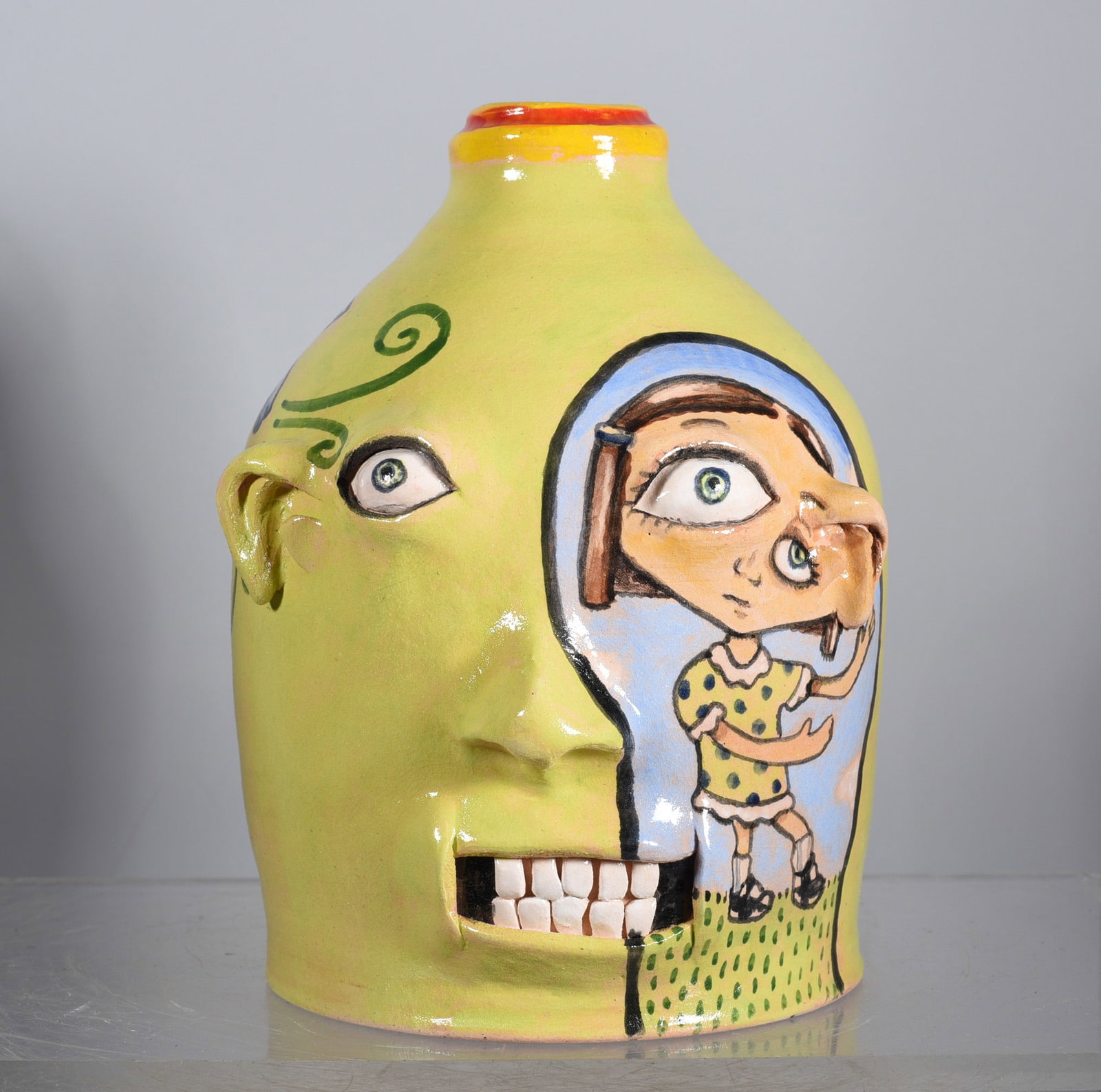 Stacy Lambert Face Jug: 6" folk pottery by North Carolina folk potter Stacy Lambert. Stacy has been created folk pottery for almost 40 years. His first works came when he worked in a leather factory and he is well known for 
