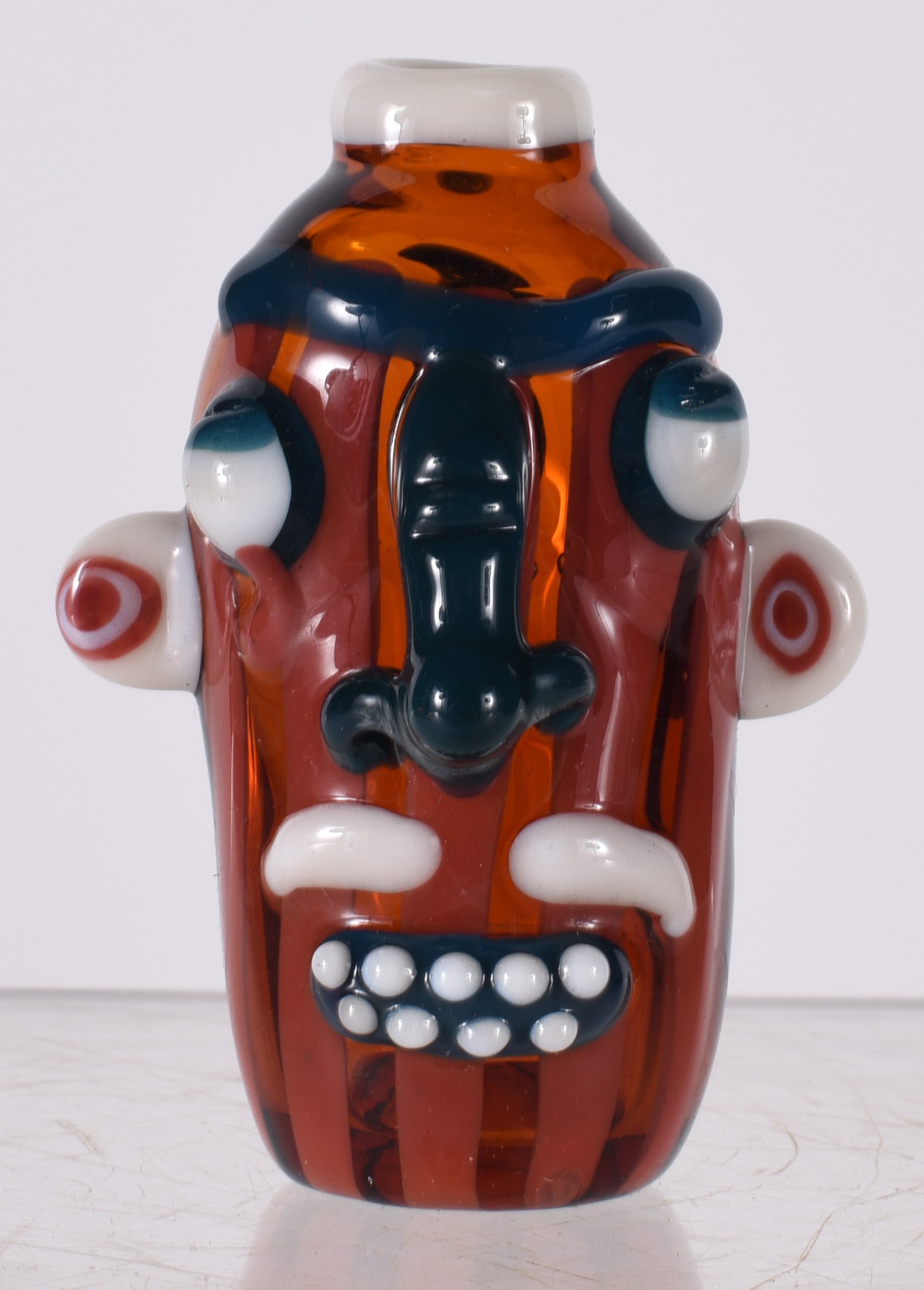 Johnny Hawkins Blown Glass Face Jug: 2.5" blown glass. An original creation by artist Johnny Hawkins of Asheville, NC.