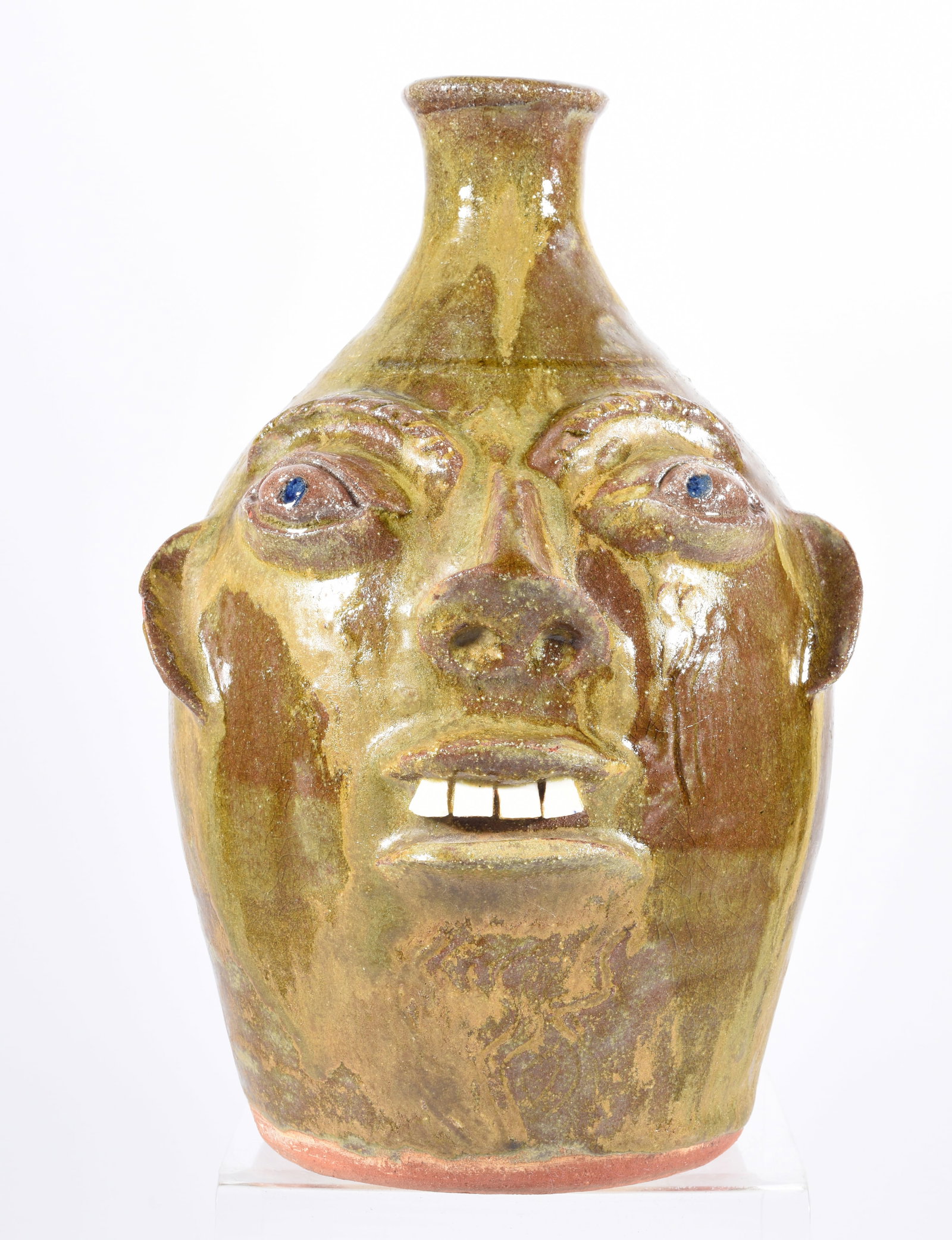 Walter Fleming Face Jug: 9.5" alkaline glaze, china teeth, signed.