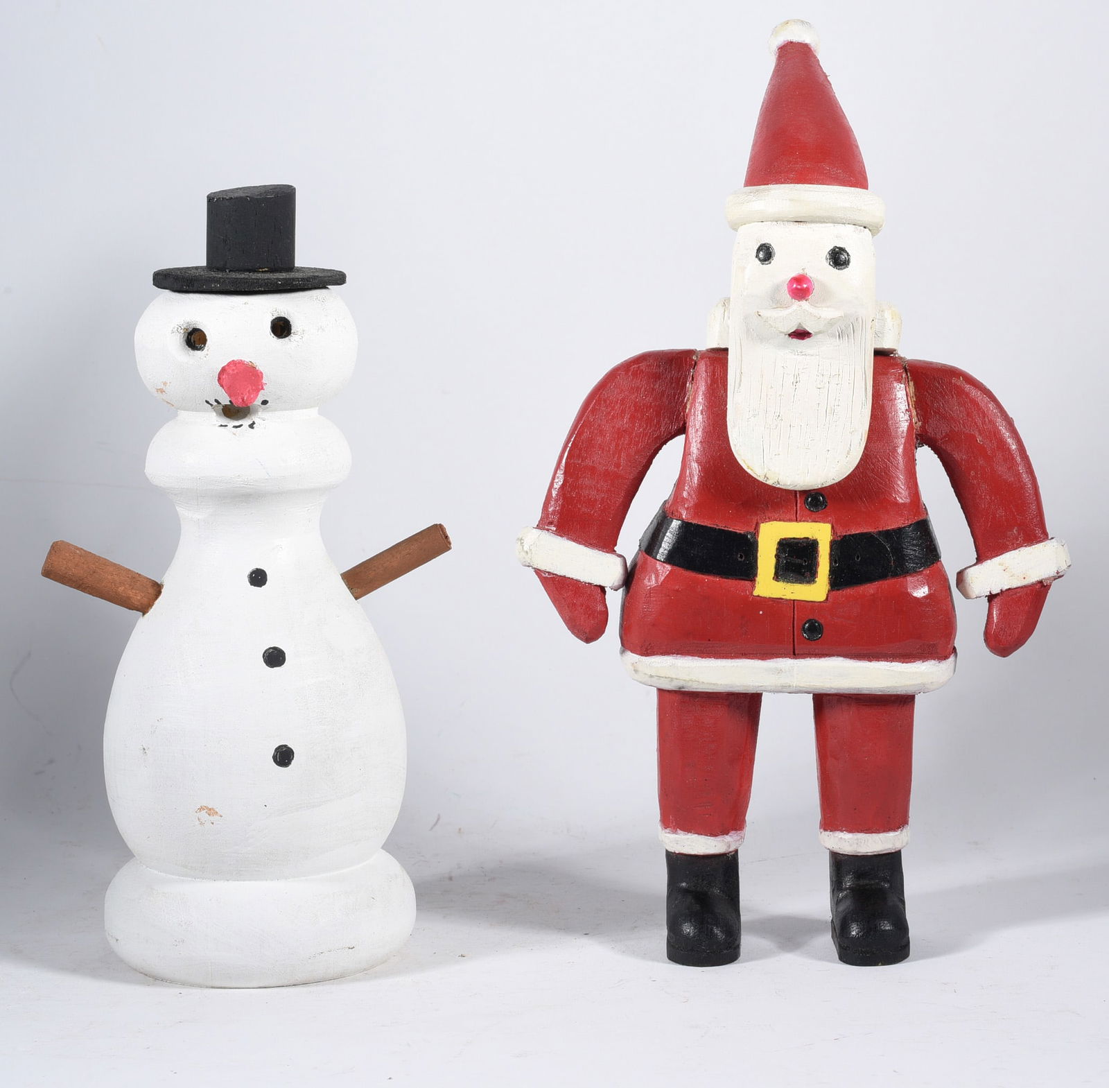 Ernie Richardson Carved Santa and Snowman: Largest is 8" wood carved and painted signed on bottom.