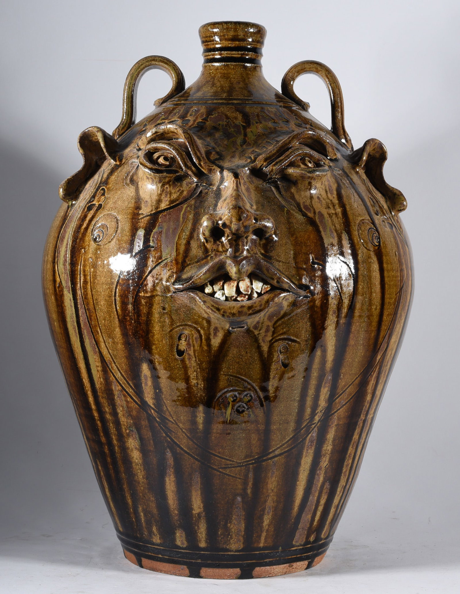 Kim Ellington Face Jug: 18" large Kim Ellington face jug, signed on back GKE. Fantastic alkaline runs with a double row of teeth.