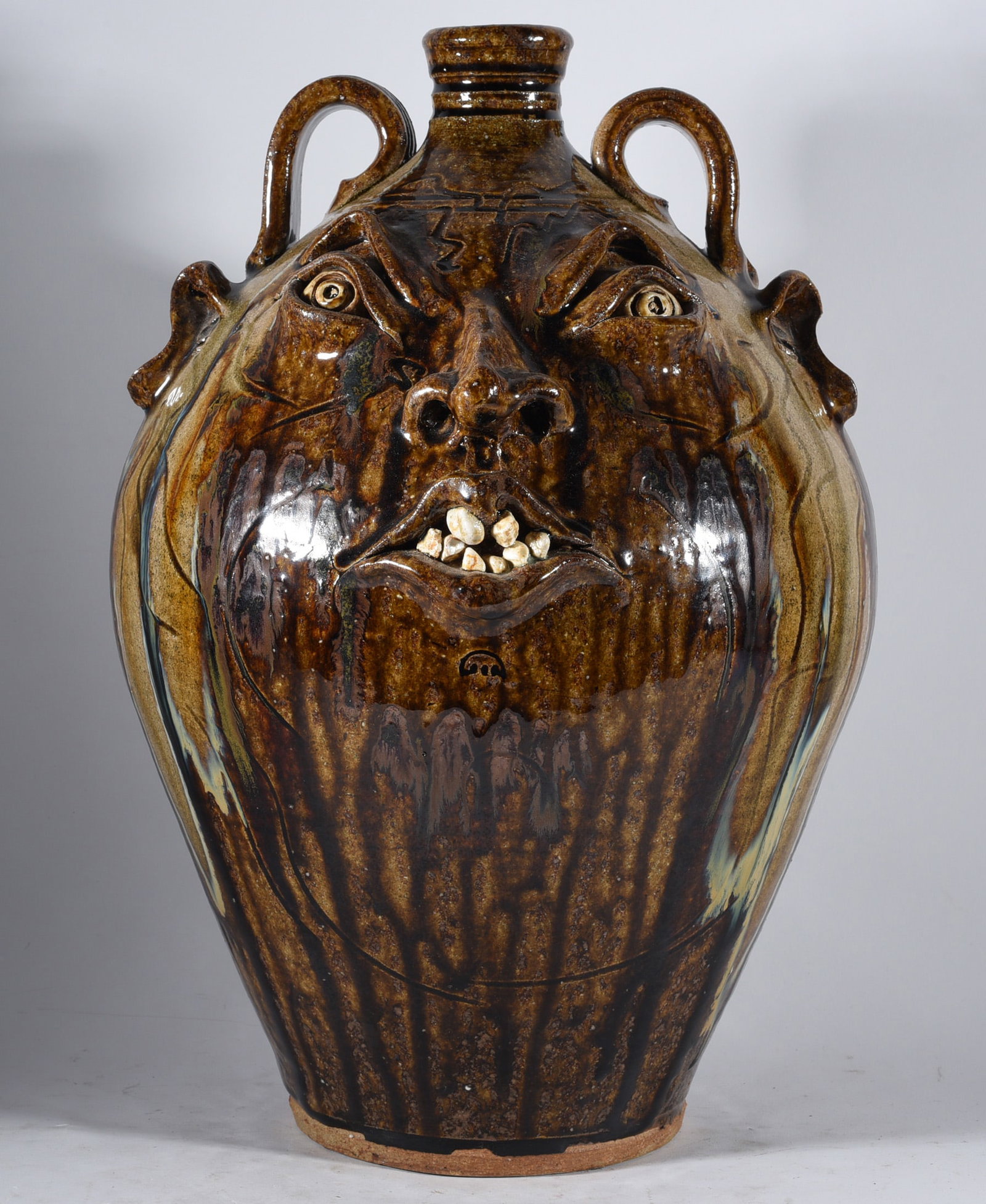 Kim Ellington Face Jug: 15.5" large Kim Ellington face jug, signed on back GKE. Fantastic alkaline runs with a double row of teeth.