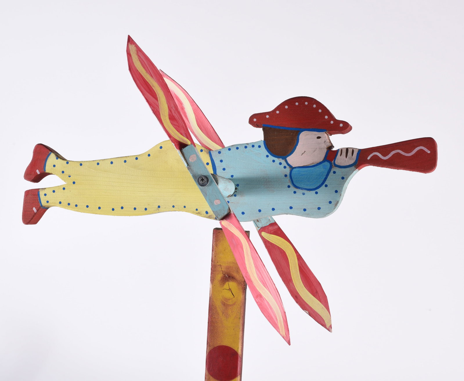 Charlie Dingler Whirligig: Total height with base is 58", whirligig is 16" x 10" signed on bottom of whirligig. Cut wood and paint.