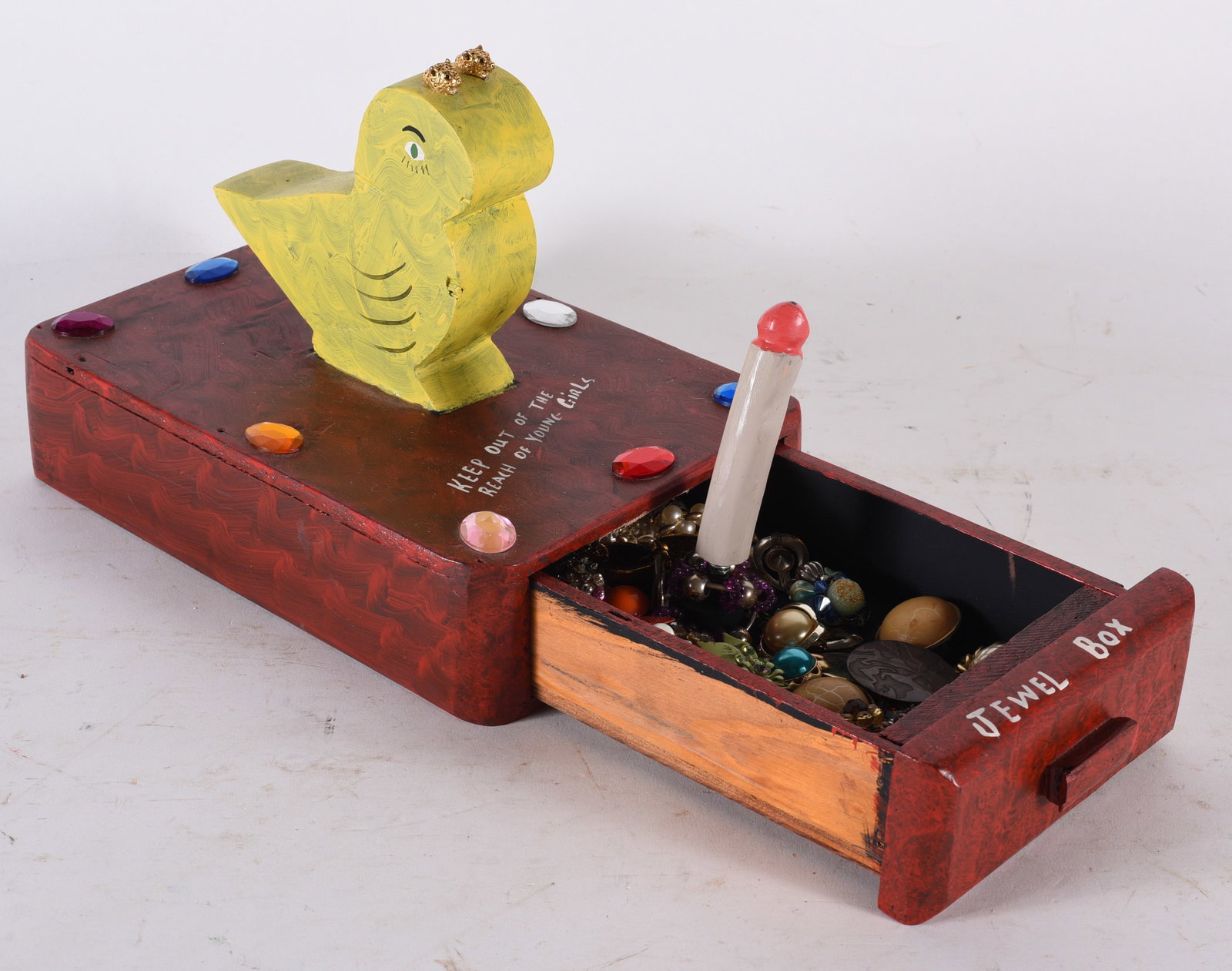 Benny Carter Folk Art Jewel Box: 11'' x 7'' x 8'' carved phallic scene with the penis popping out of the drawer. Painted box by Benny Carter. Wood carving by Benny Carter