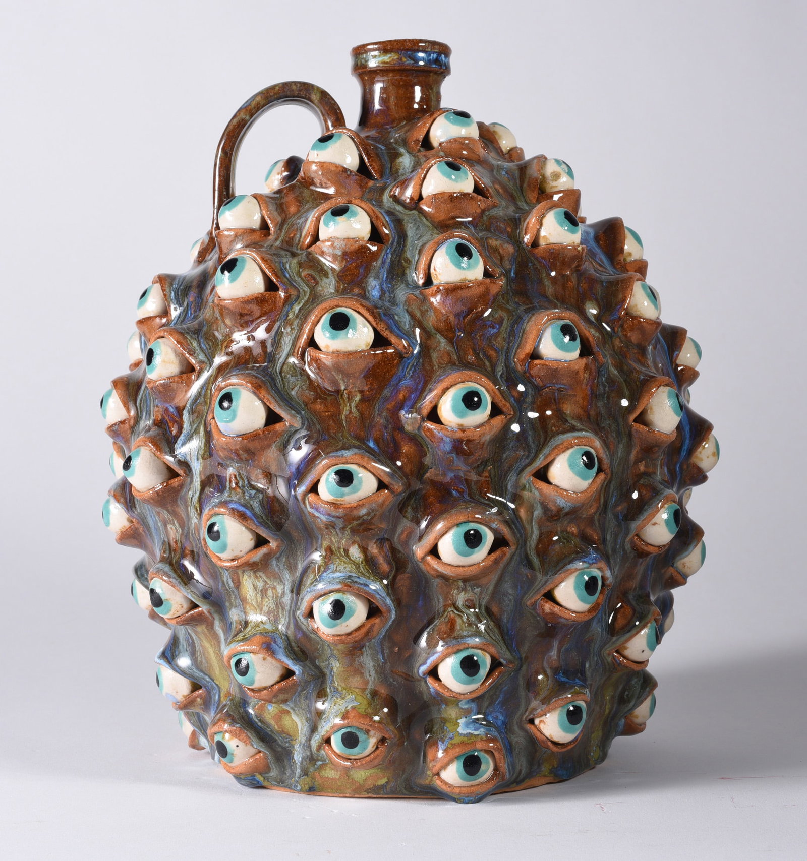 Marvin Bailey Eyeball Jug: 10" eyeball jug in the traditional 1 gallon size. Outstanding glaze and form. Signed on bottom.