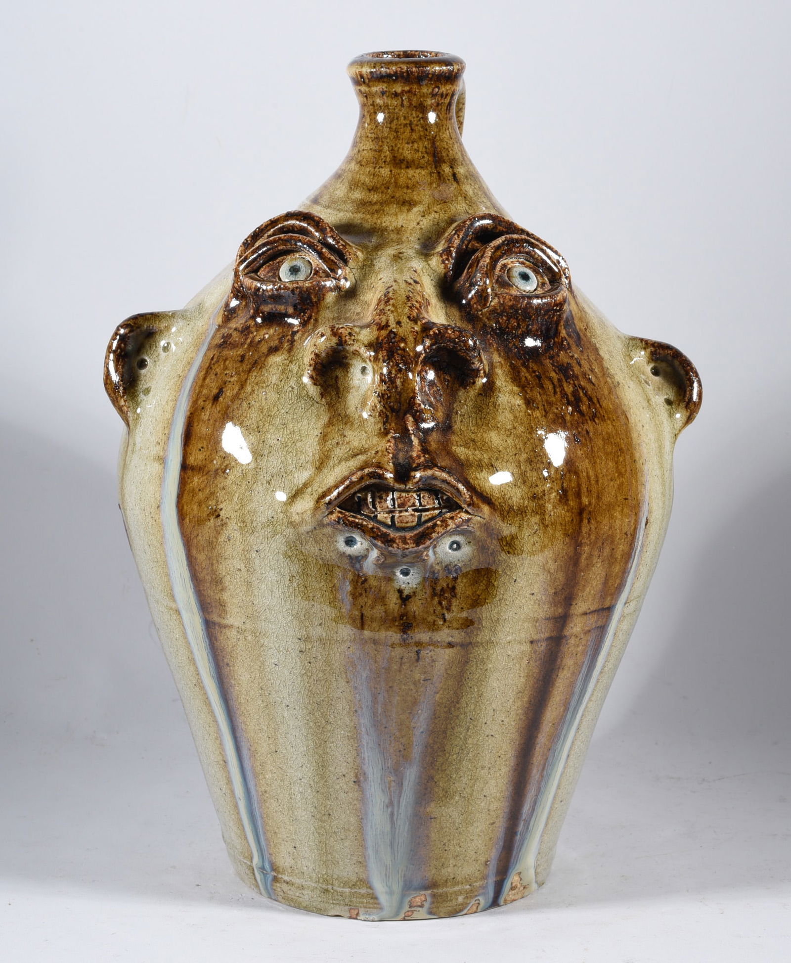 Pottery Face Jug signed TRW (1 of 5)