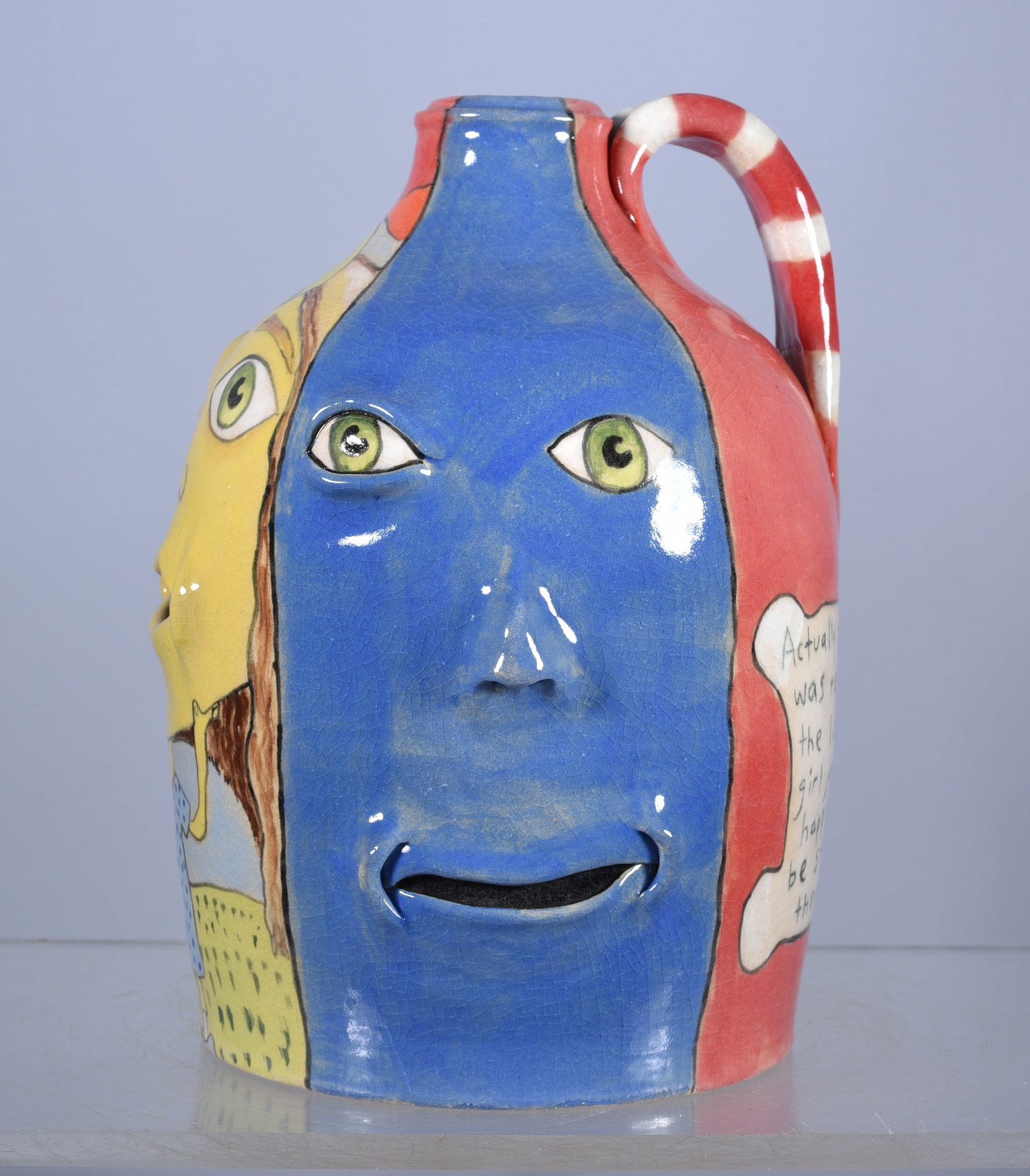 Stacy Lambert Folk Pottery with Nadine Lambert: jug turned by Stacy Lambert, face applied by Nadine Lambert. Signed on bottom and dated 2014.