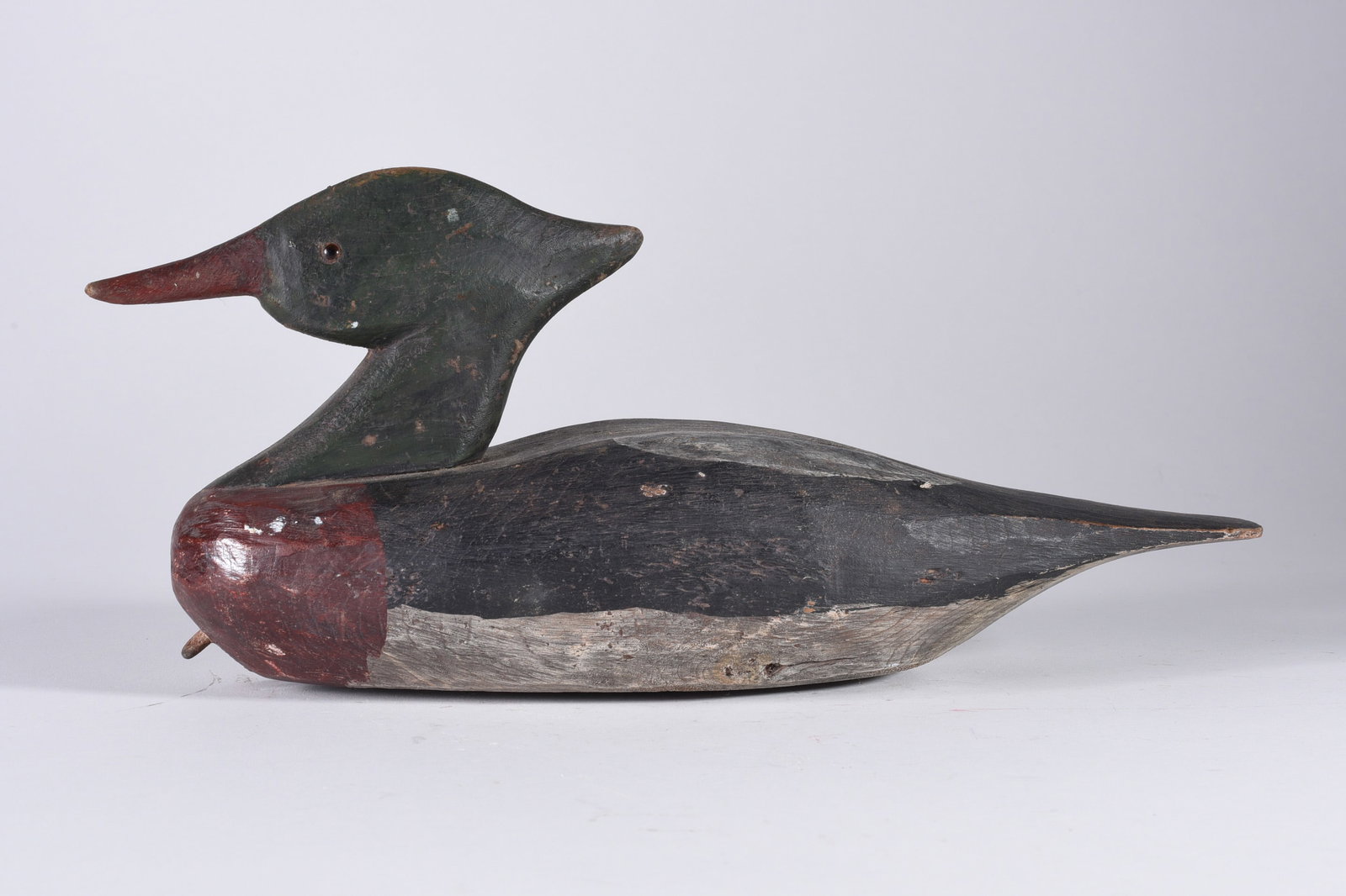 Romie Waterfield Family Carved Decoy: 14" Romie Waterfield wood carved decoy, original paint. From the collection of Quincy Scarborough