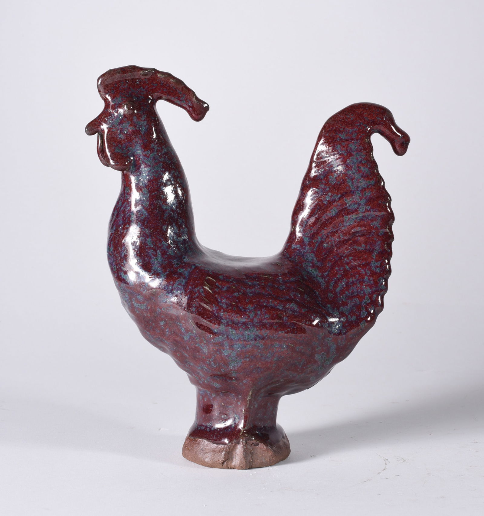 Charles Moore Chinese Red Rooster: 6.5" x 8.5" rare chinese red glaze. Signed on bottom.