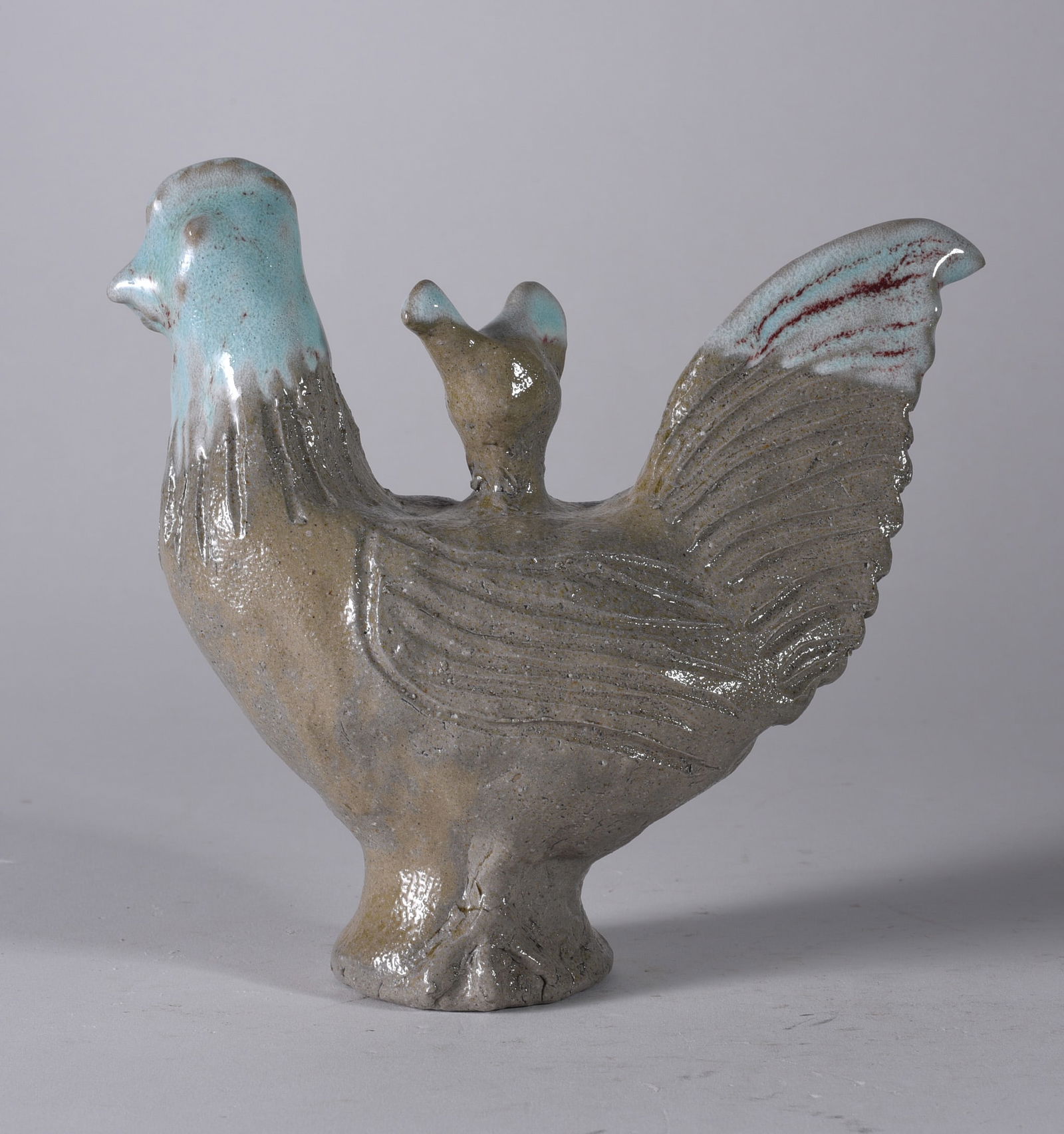 Charles Moore Rooster: 7" x 7" rare two toned rooster with hen on the back of the rooster. Signed on bottom.