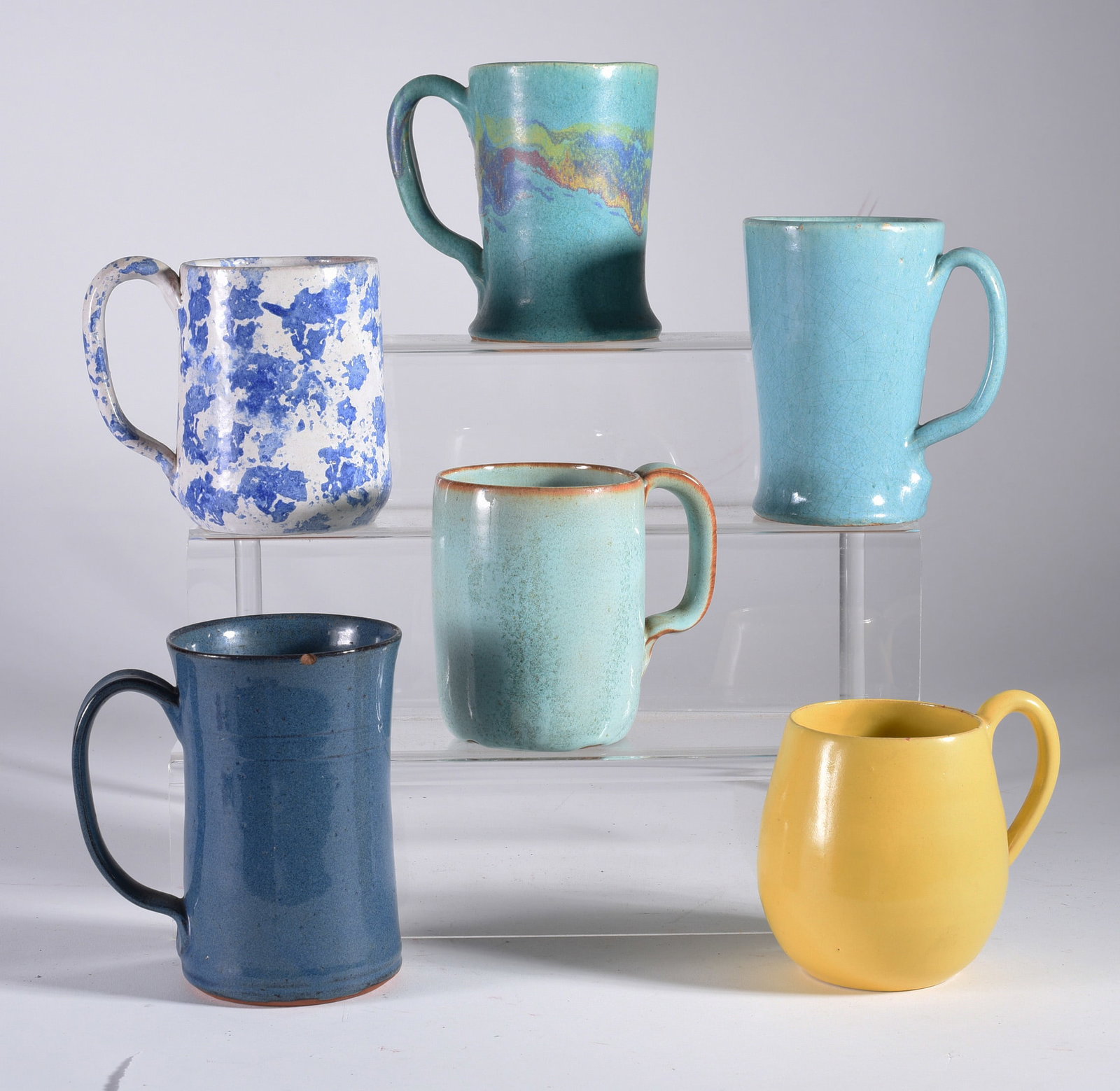 North Carolina Pottery Mugs: 5" N. Owes, Cole Pottery, Rainbow Pottery and others. Some are signed on the bottom.