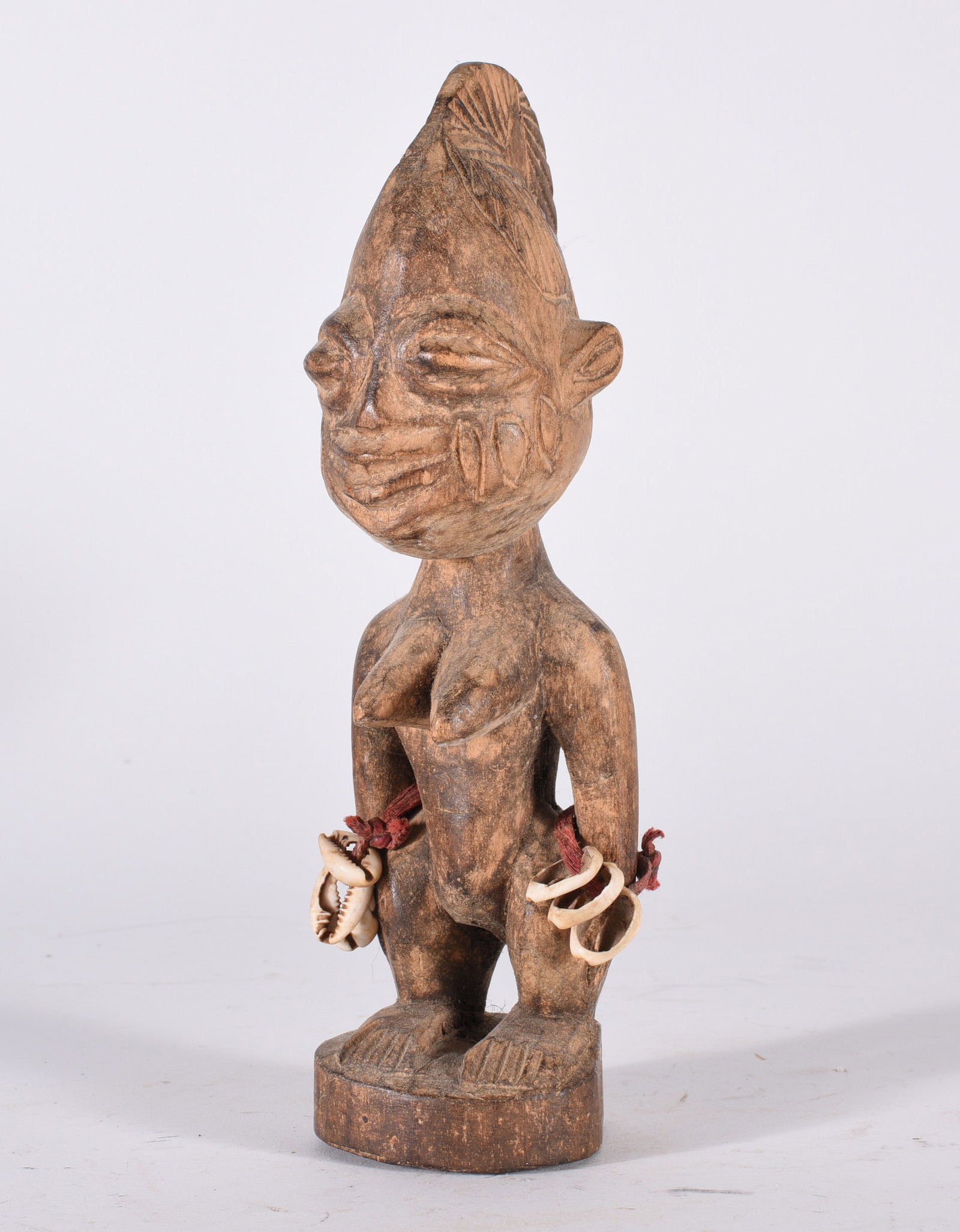 Wood Carving: 9" from the collection of Dr. Richard Seed.