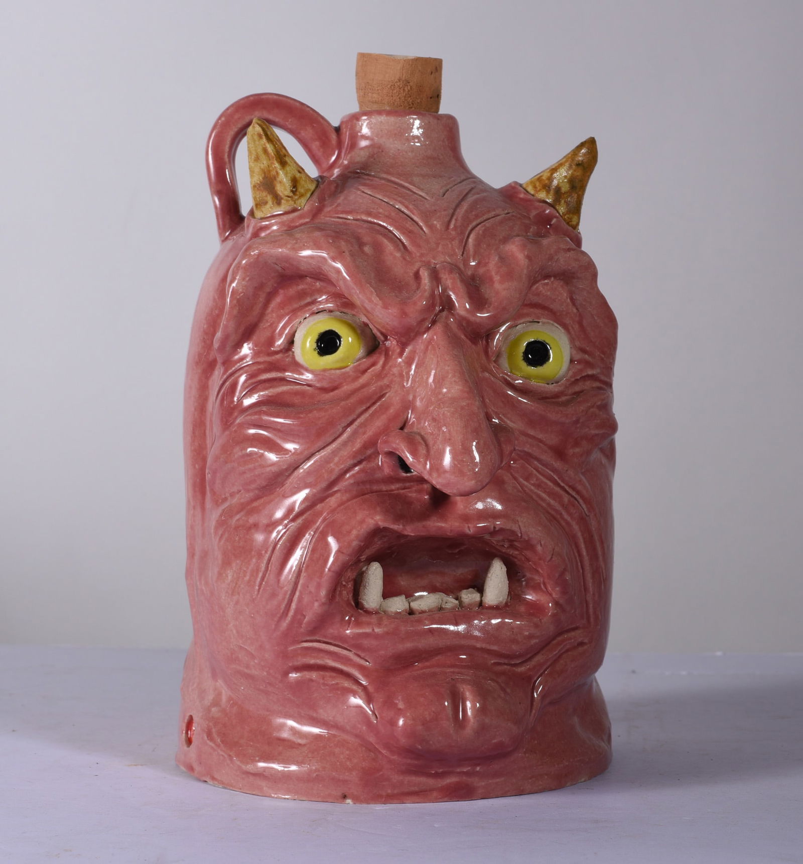 Folk Pottery Devil Face Jug (1 of 3)