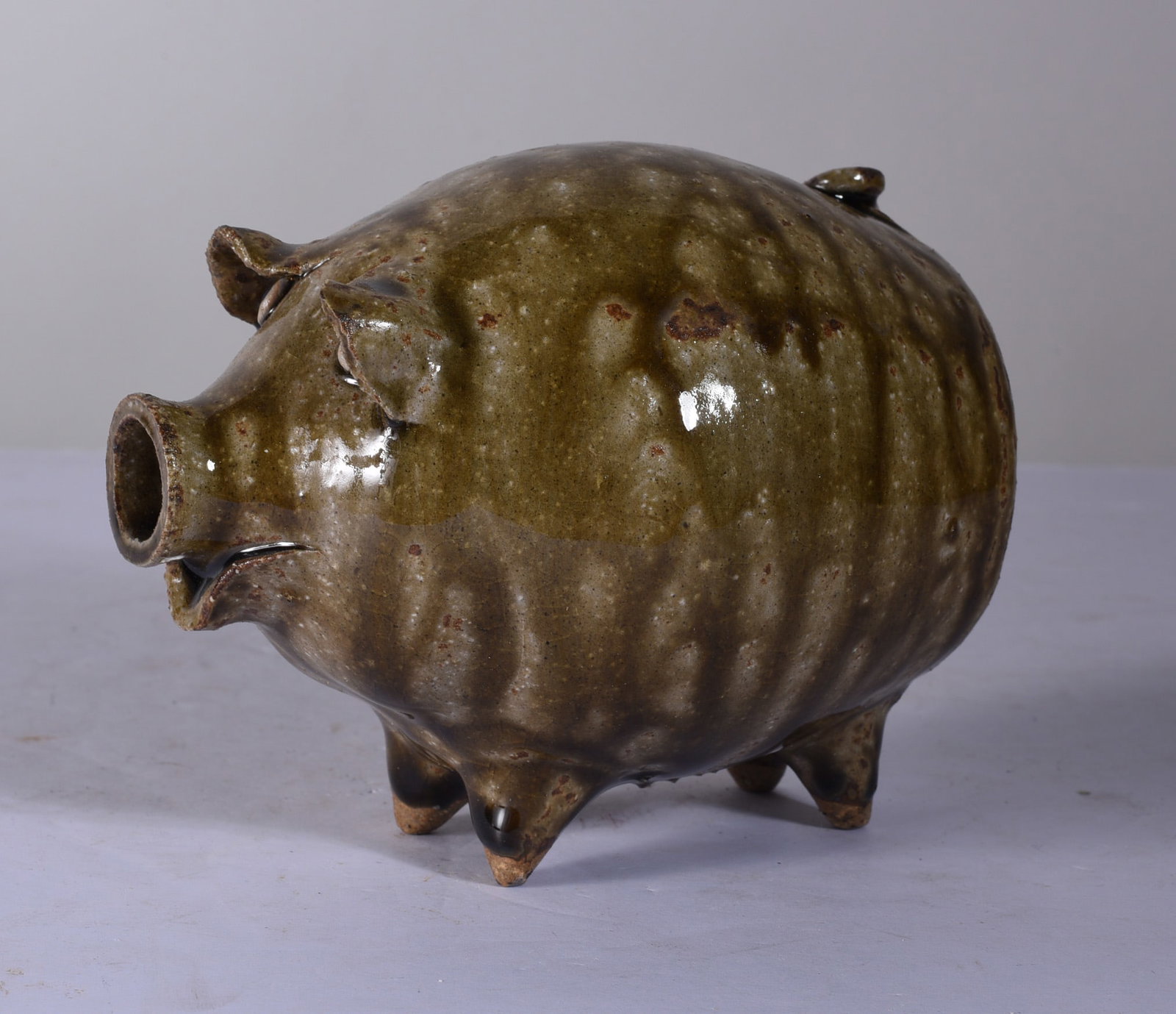 Alkaline Glaze Pottery Pig: 5"x4" pottery pig, alkaline glaze pig signed on bottom.