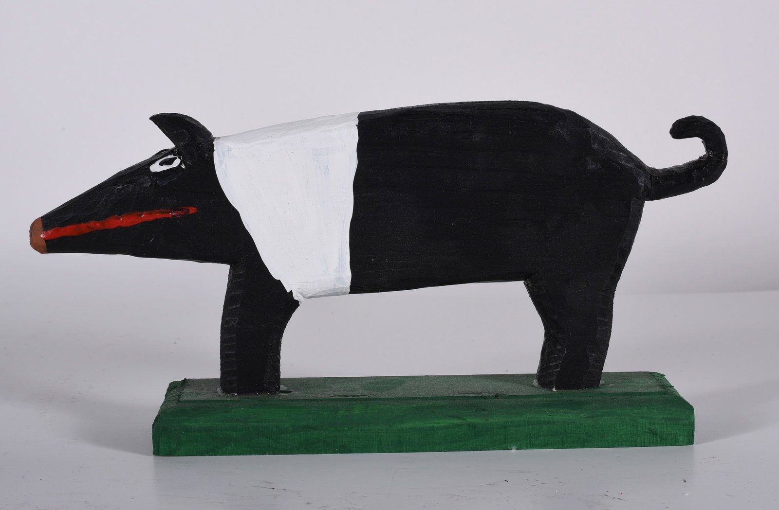 Minnie Adkins Carved Animal on Base: 10-1/2"x5" carved wood and paint. Signed.