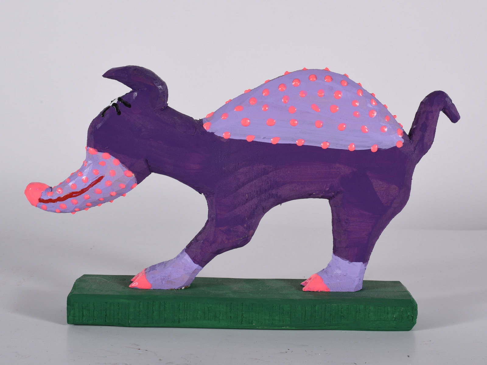 Minnie Adkins Carved Animal on Base: 10"x6" carved wood and paint. Signed.