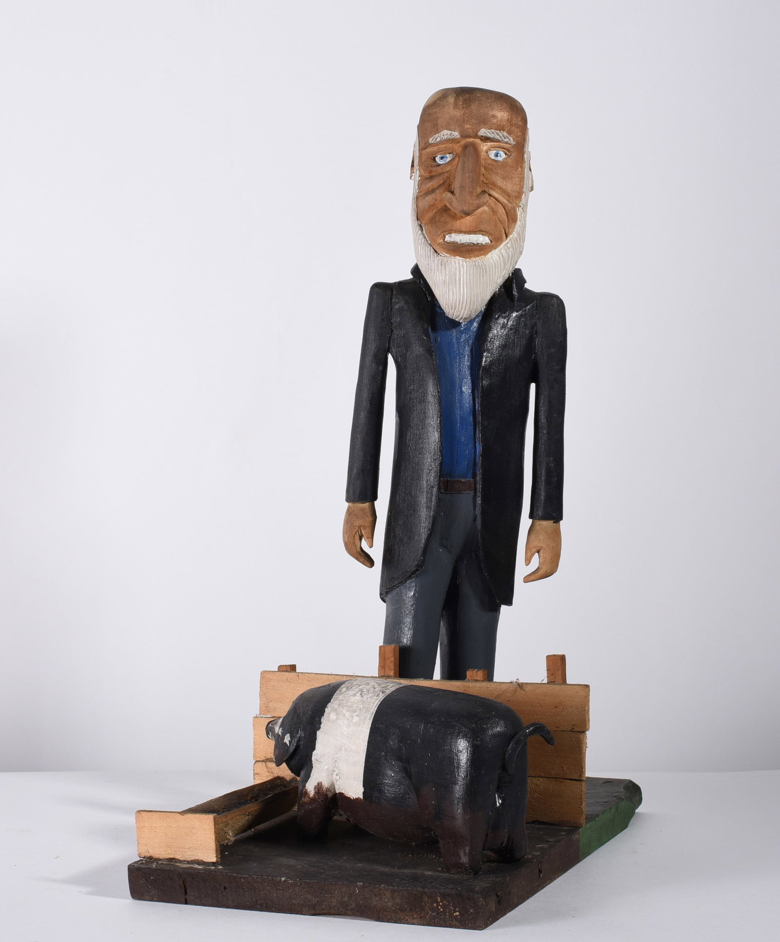 Rothel King Folk Carving: 18-1/2" carved wood and paint, mounted to base by artist. Signed on bottom.