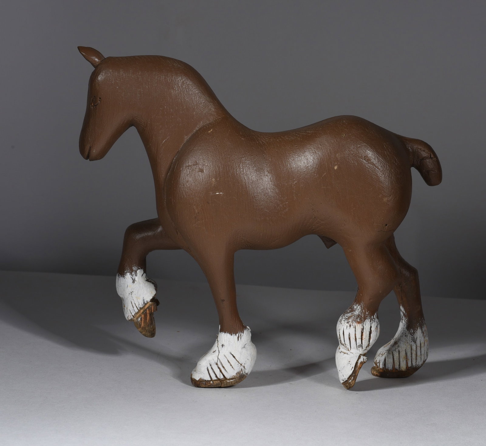 Carved and Painted Wooden Horse: 8"x8" carved wood and paint. from the collection of Larry Hackley.