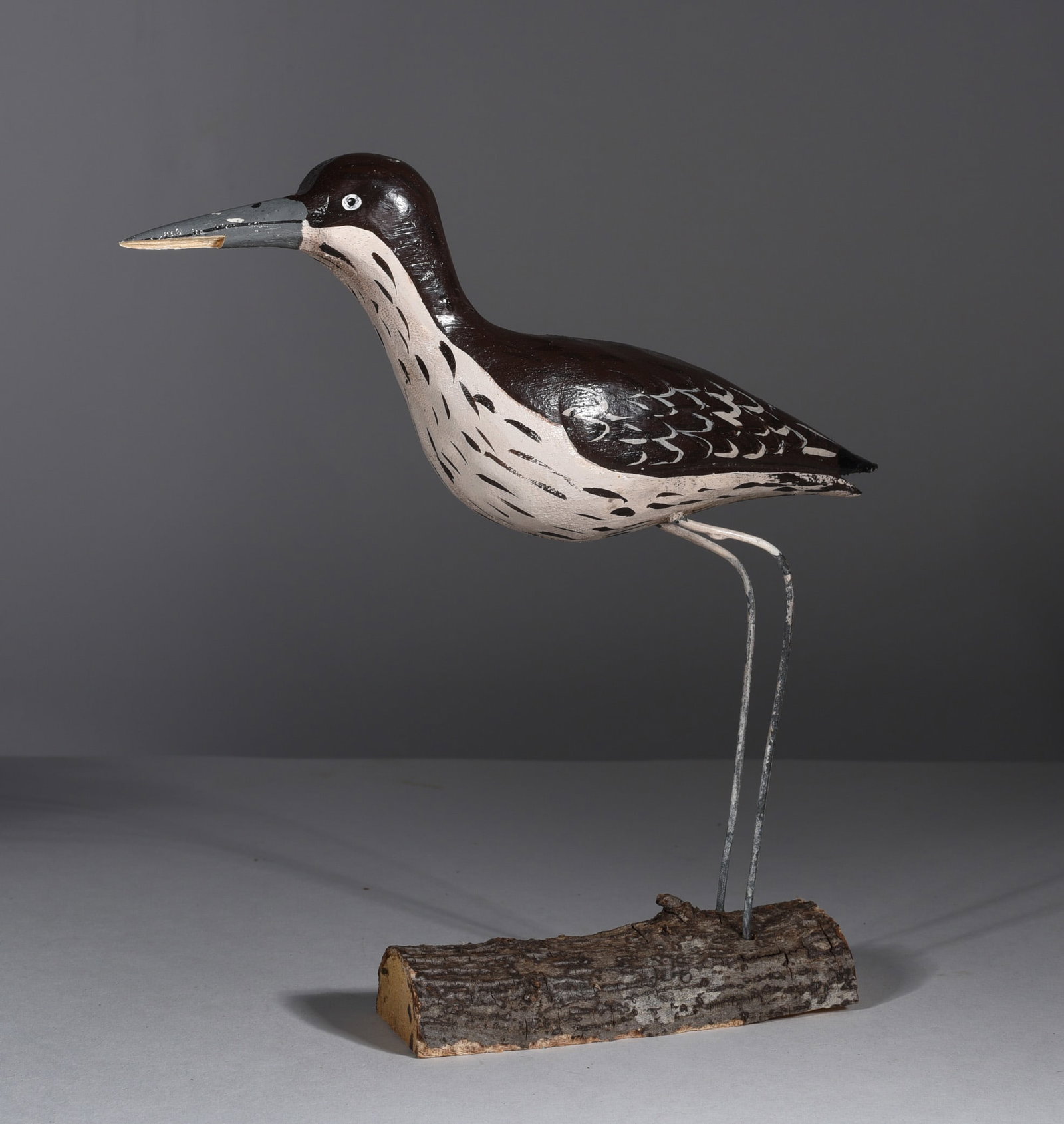 Carved Wooden Bird: 8"x9" carved bird, from the collection of Larry Hackley.