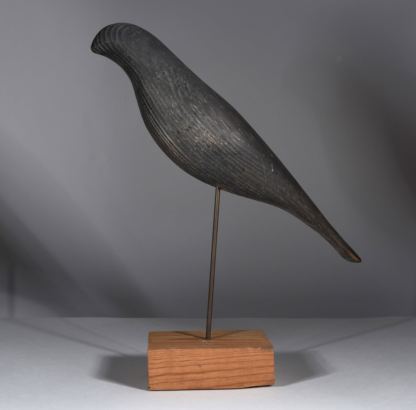 Carved Wooden Crow: 10"x14-1/2" carved wood and paint. from the collection of Larry Hackley.