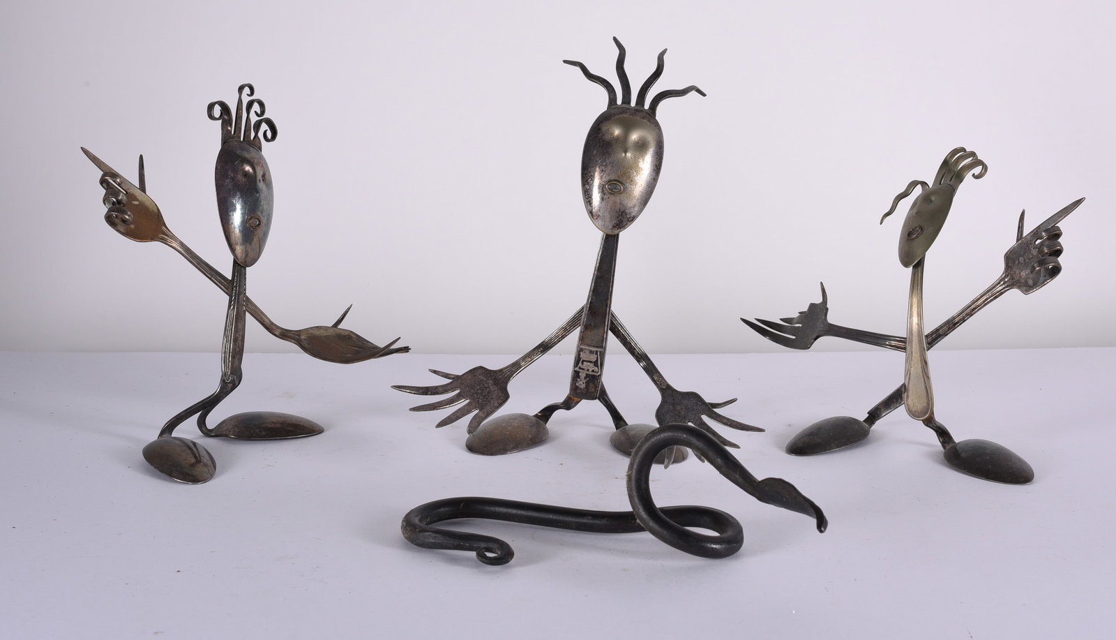 Folk Made Spoon People and Iron Snake: Snake is 7", average height of spoon people 8". iron snake and folk made spoon people.