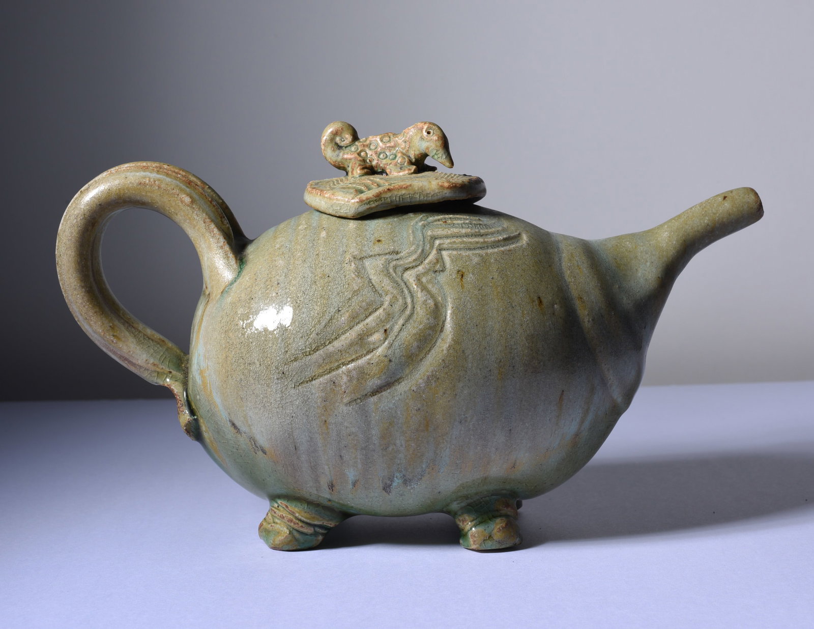 North Carolina Pottery Tea Pot: 9"x6" outstanding tea pot from a North Carolina artist. From a single owner private collection. A great addistion to any southern pottery collection. Condition is excellent.