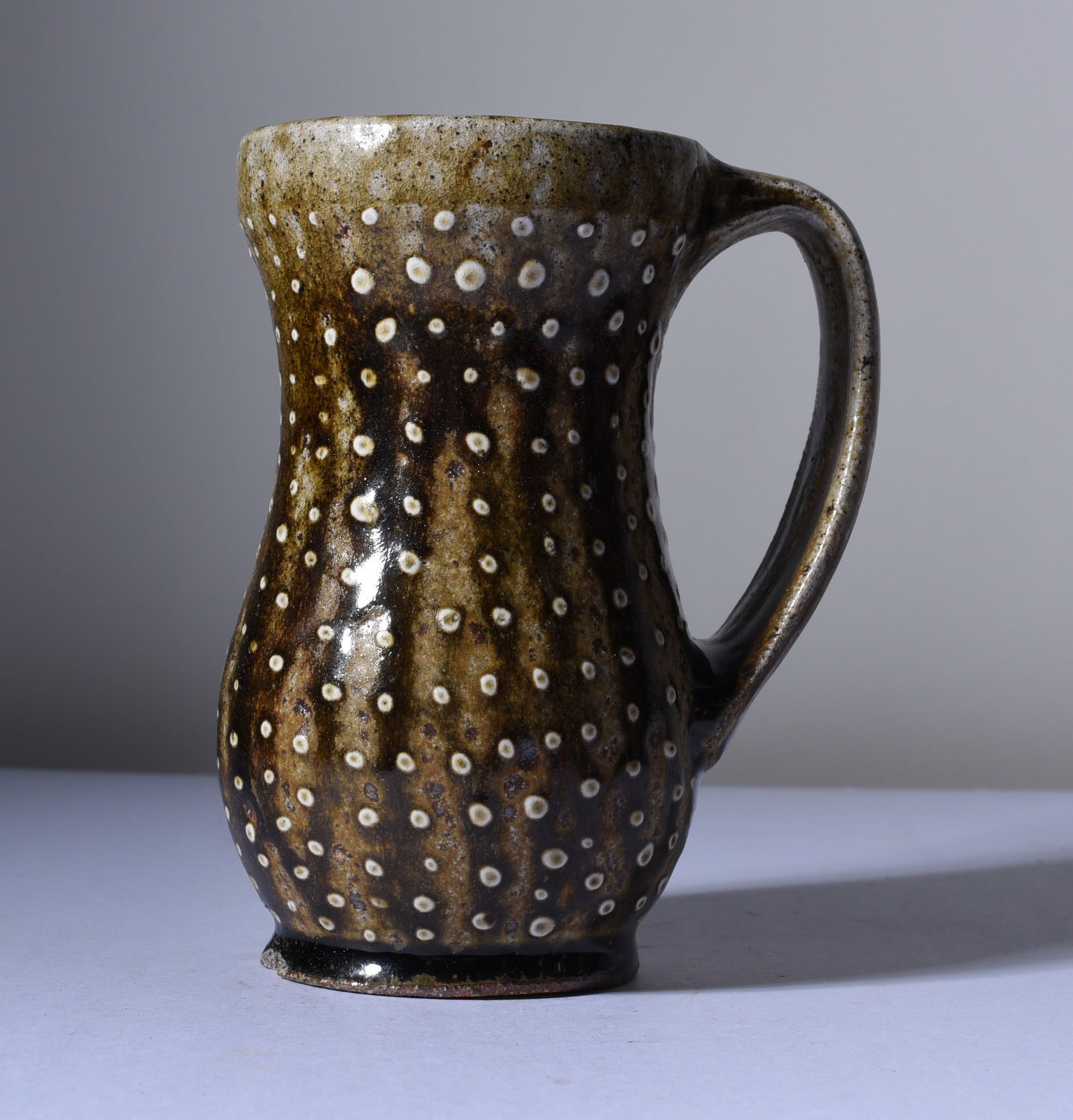 North Carolina Folk Pottery Mug: 5-1/2" all pottery is from an estate and if it has issues we will note it else it is in fine condition. This collection comes from a single owner and they loved the pottery and the artist. Most of thi