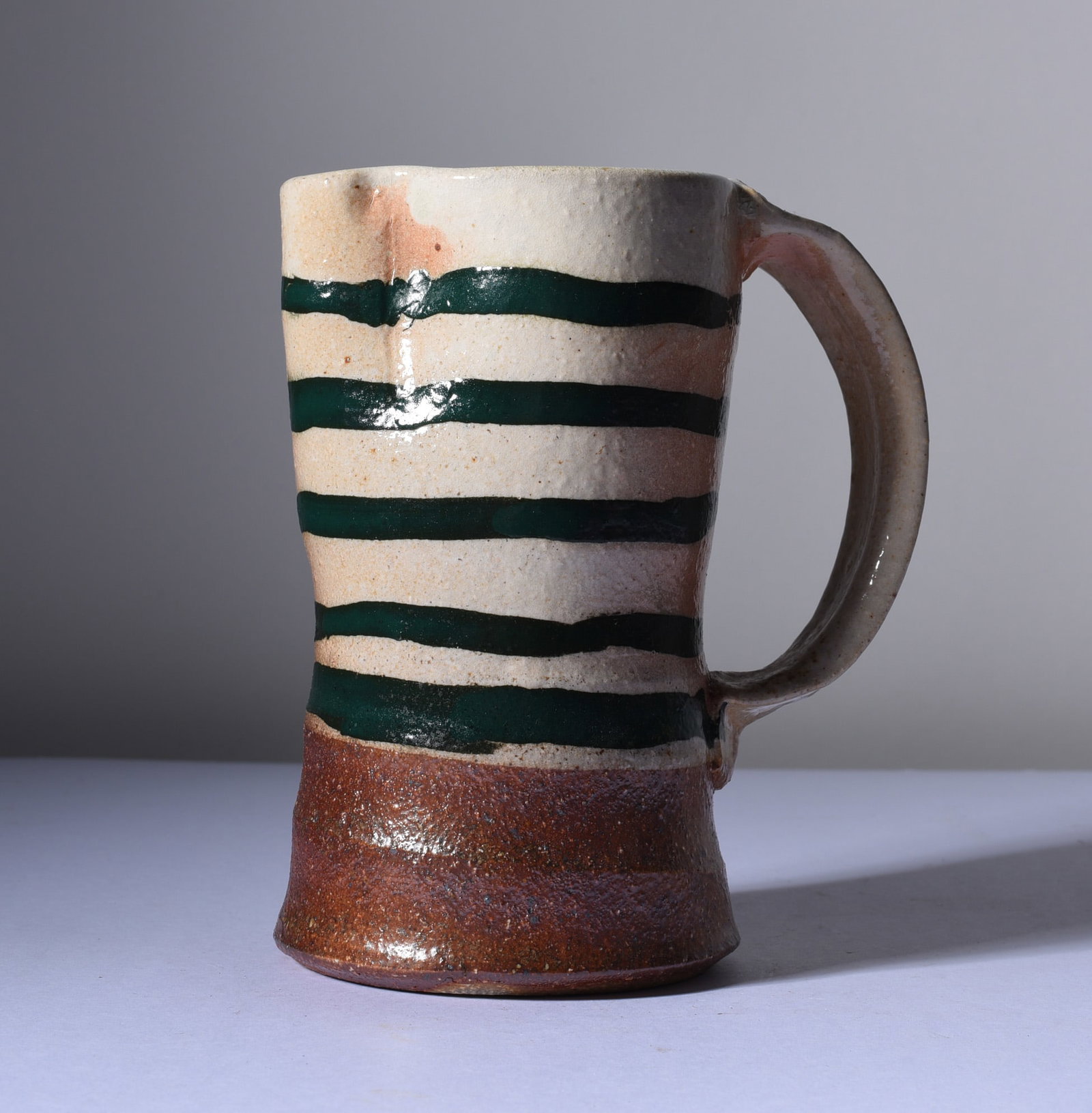 North Carolina Folk Pottery Mug: 5-1/2" all pottery is from an estate and if it has issues we will note it else it is in fine condition. This collection comes from a single owner and they loved the pottery and the artist. Most of thi