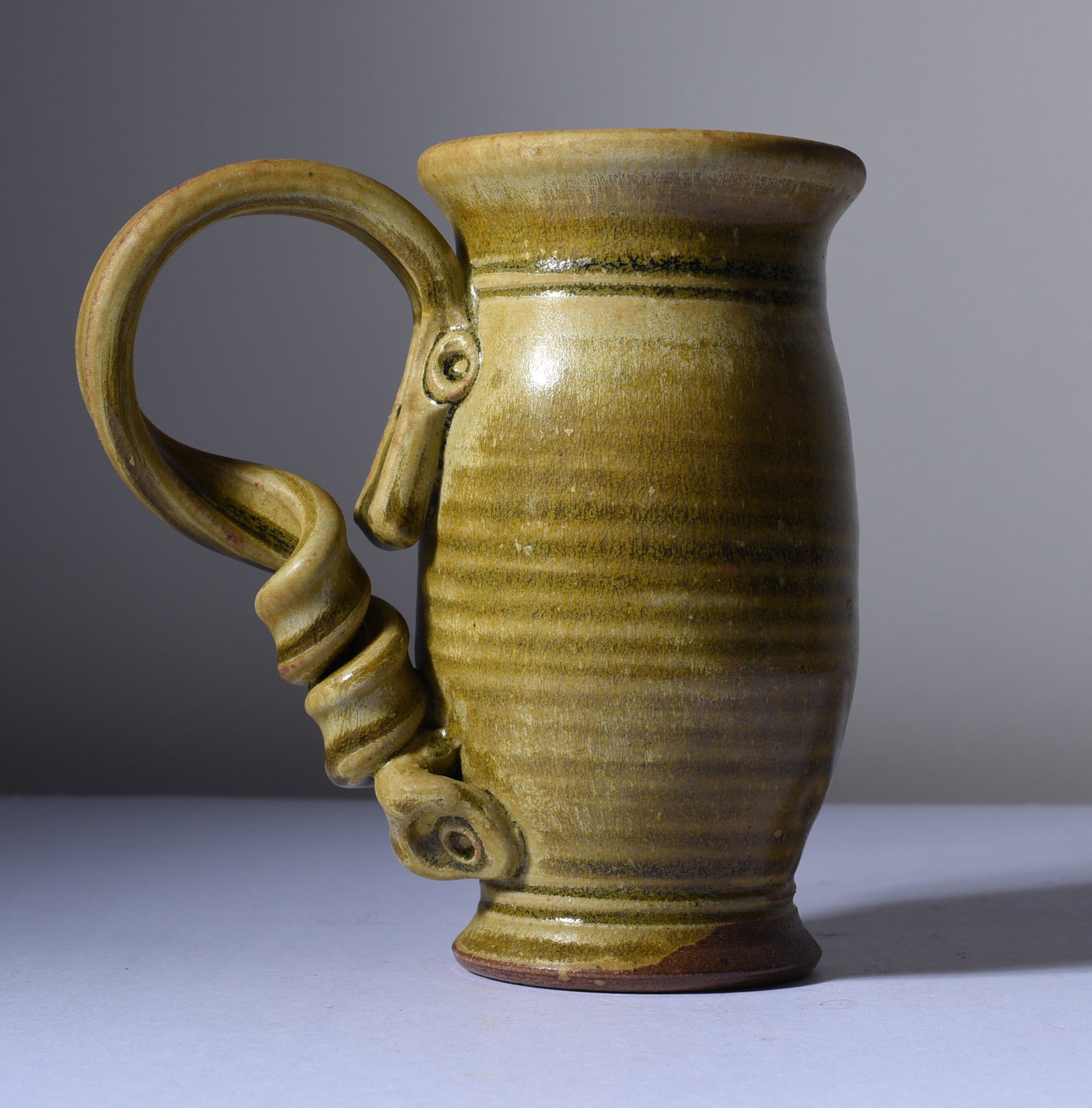 North Carolina Folk Pottery Mug: 5-1/2" all pottery is from an estate and if it has issues we will note it else it is in fine condition. This collection comes from a single owner and they loved the pottery and the artist. Most of thi