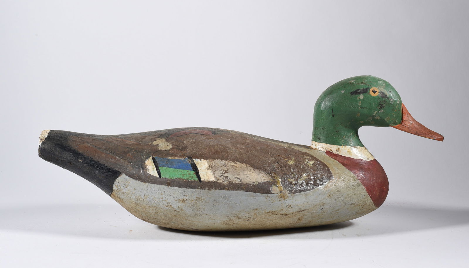 Wood Decoy Carved by Quincy Scarborough: 15" carved wood and paint, carved by Quincy Scarborough, signed on bottom.