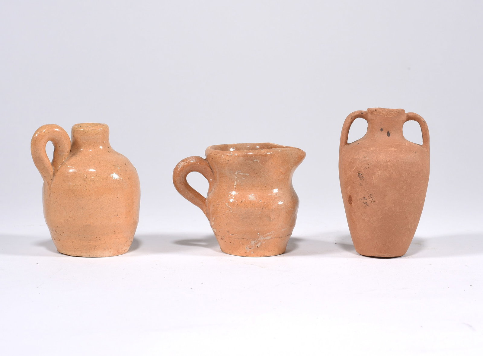Miniature Pottery Group: Average size 2", two pieces are hilton pottery, the 3rd one is uknown.