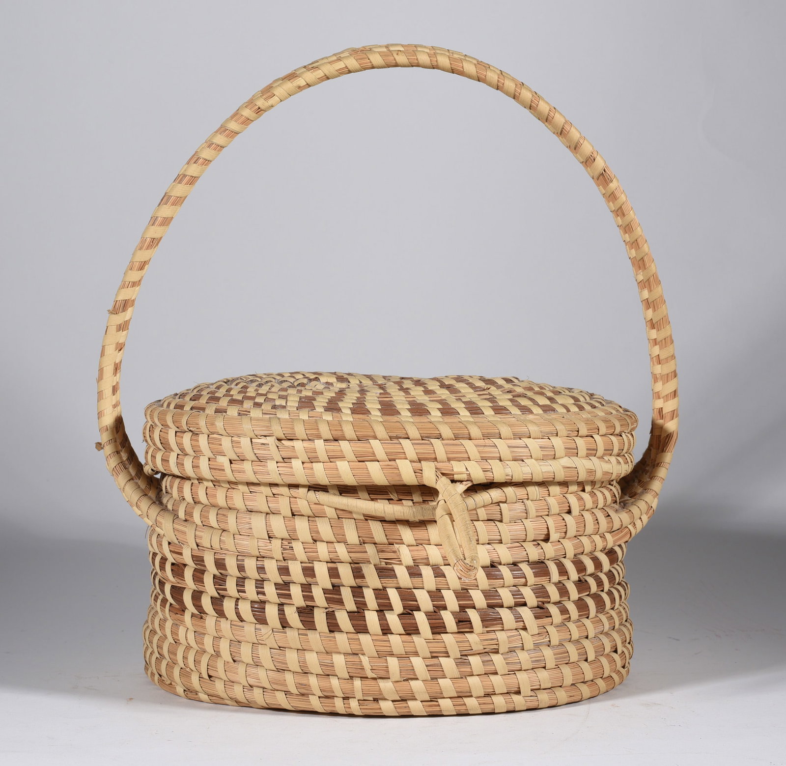 Sweat Grass Basket: 11"x11" made by Annebella Ellis.