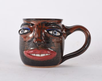 Pottery Face Jug Mug