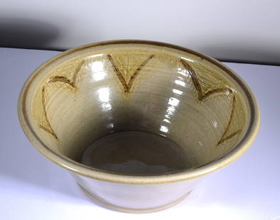 Pamela Owen Slip Decorated Bowl: slip decorated pottery bowl by Pamela Owen, stamped jugtown. Signed on bottom.