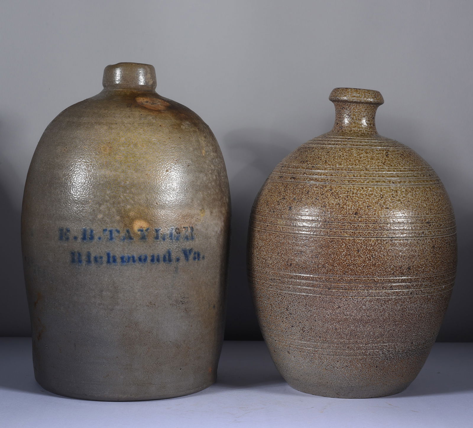 EB Taylor Stoneware and NC Pottery Jug damage (1 of 3)
