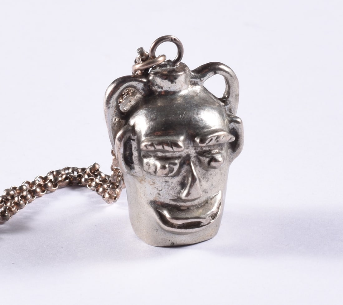 Miniature Silver Face Jug on Chain (1 of 2)