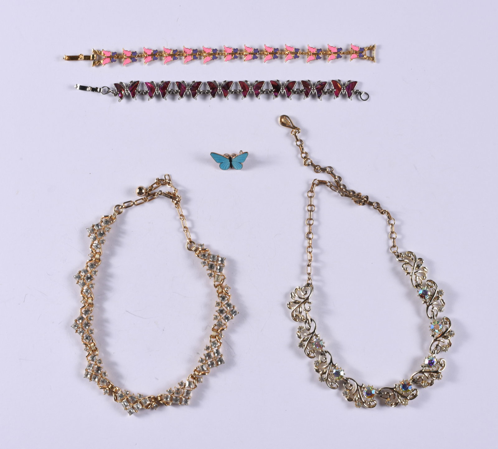 Butterfly Bracelet and Necklace Group: This is a collection of jewelry from two estates. All items are sold as is where is. We can in house ship and our price is below under condition. The price to the right is 3rd party shipping. To get i