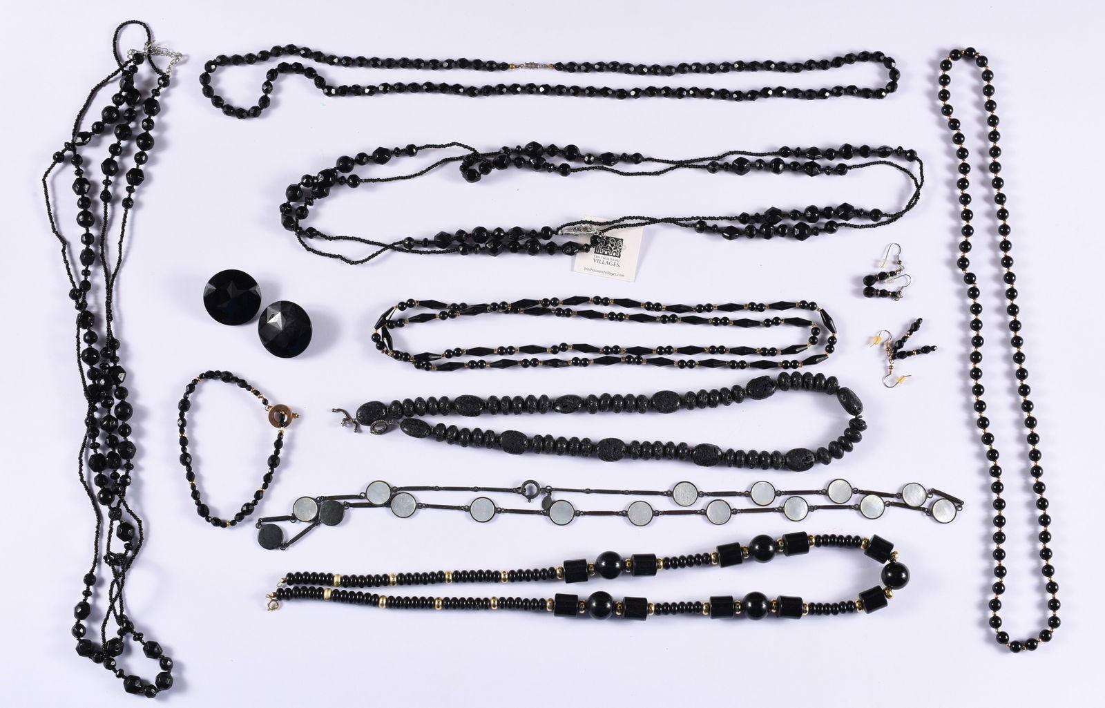 Vintage Black Bead Jewelry: This is a collection of jewelry from two estates. All items are sold as is where is. We can in house ship and our price is below under condition. The price to the right is 3rd party shipping. To get i