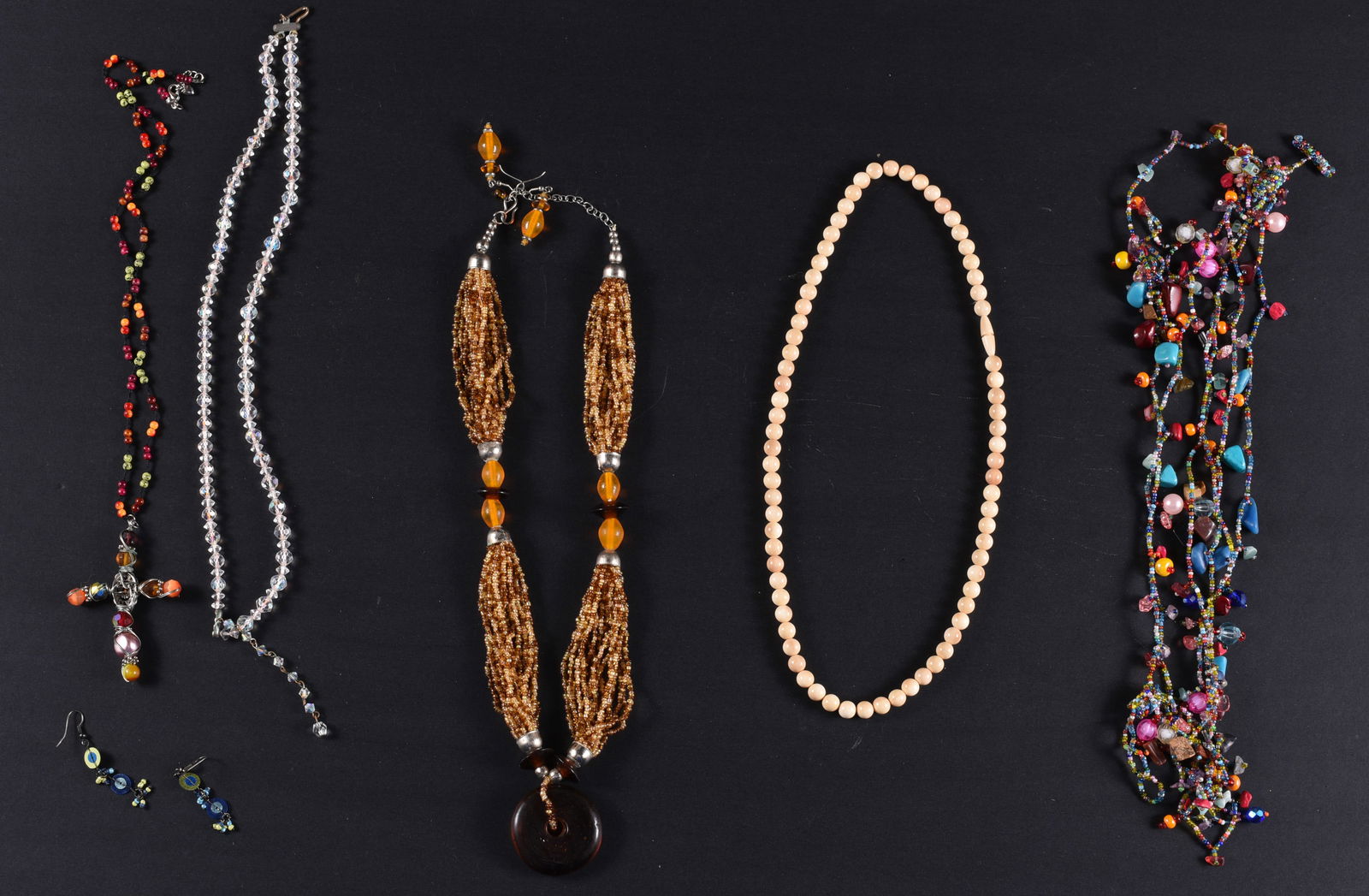Vintage Beaded Necklace Group: This is a collection of jewelry from two estates. All items are sold as is where is. We can in house ship and our price is below under condition. The price to the right is 3rd party shipping. To get i