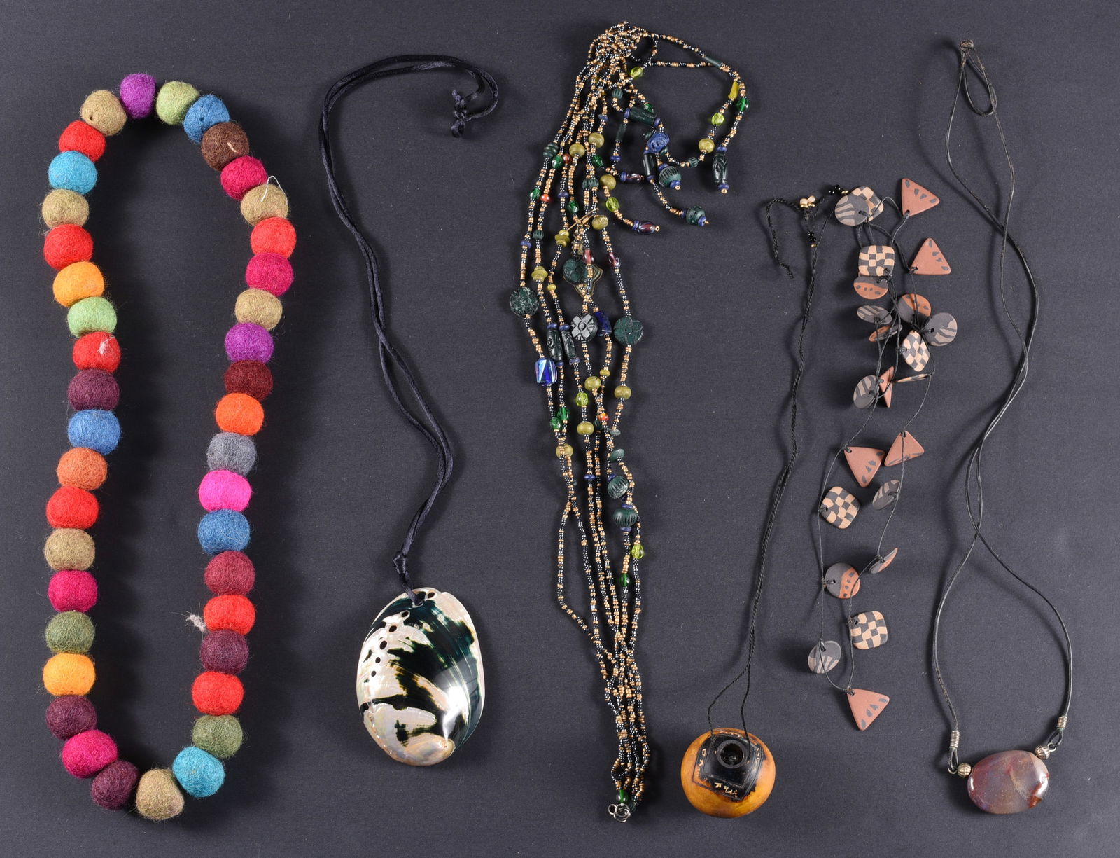 Vintage Tribal Necklace Group: This is a collection of jewelry from two estates. All items are sold as is where is. We can in house ship and our price is below under condition. The price to the right is 3rd party shipping. To get i