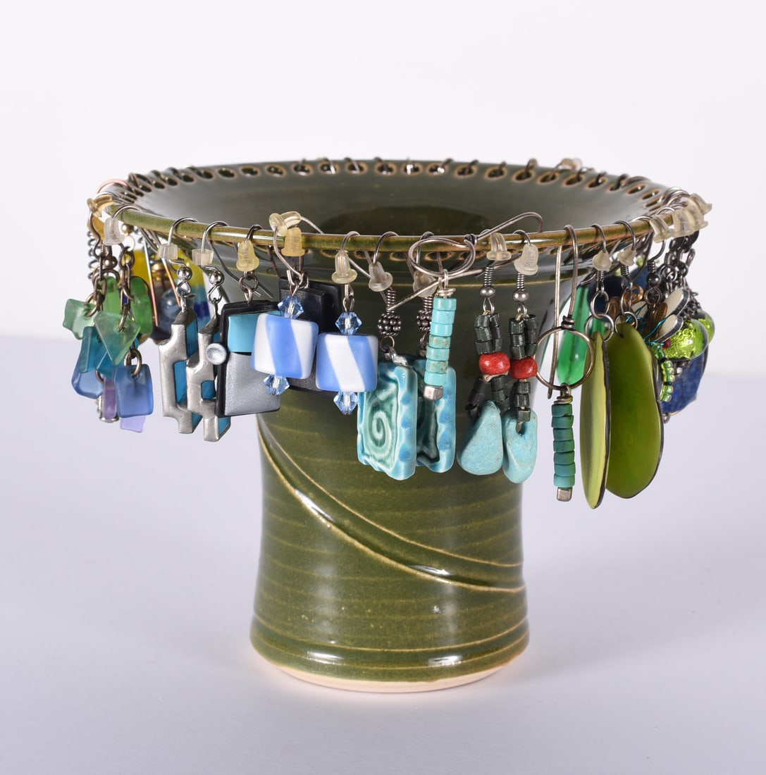 Vintage Earing Collection on Pottery Earing Stand: This is a collection of jewelry from two estates. All items are sold as is where is. We can in house ship and our price is below under condition. The price to the right is 3rd party shipping. To get i