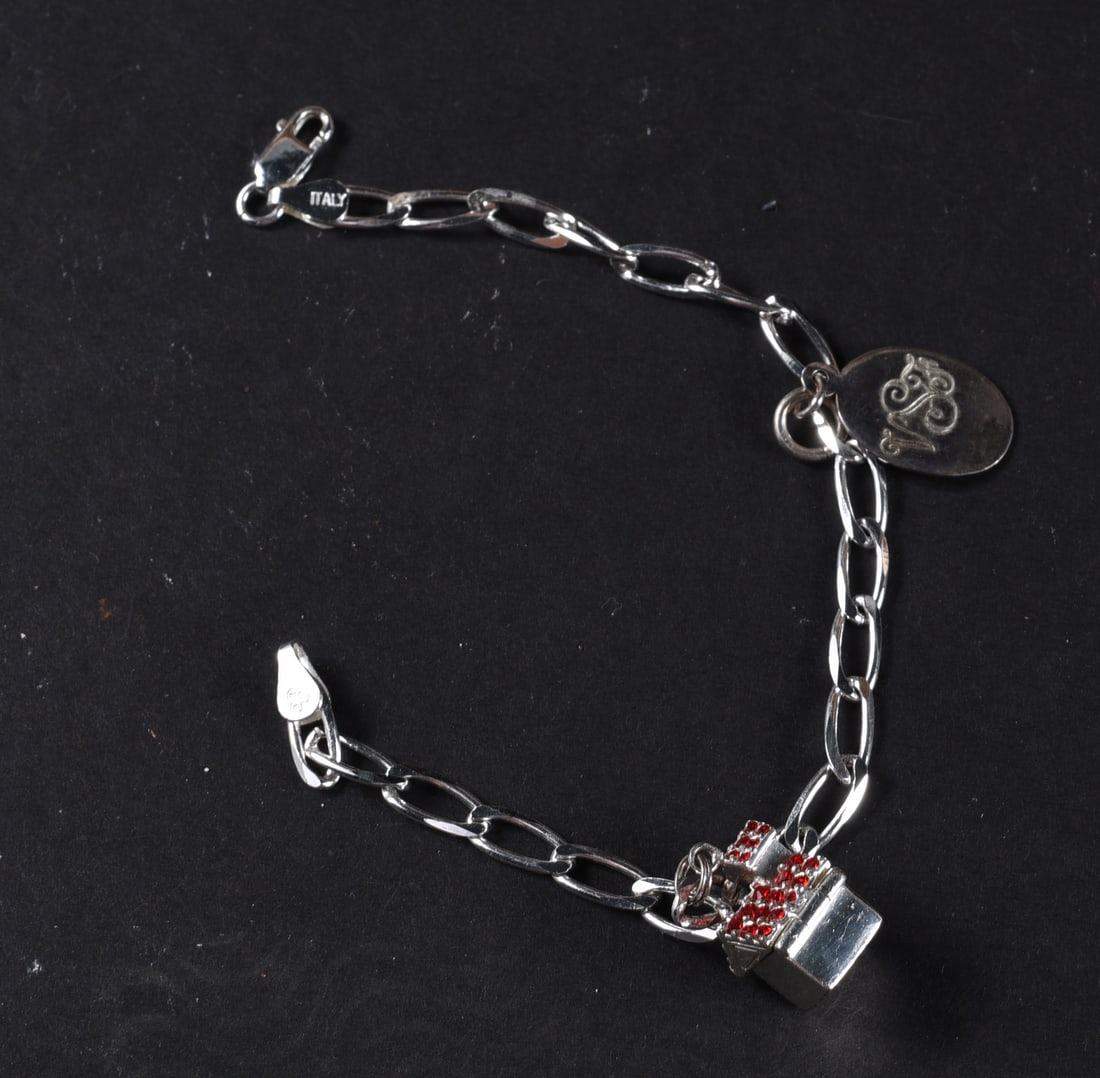Silver Charm Bracelet: This is a collection of jewelry from two estates. All items are sold as is where is. We can in house ship and our price is below under condition. The price to the right is 3rd party shipping. To get i