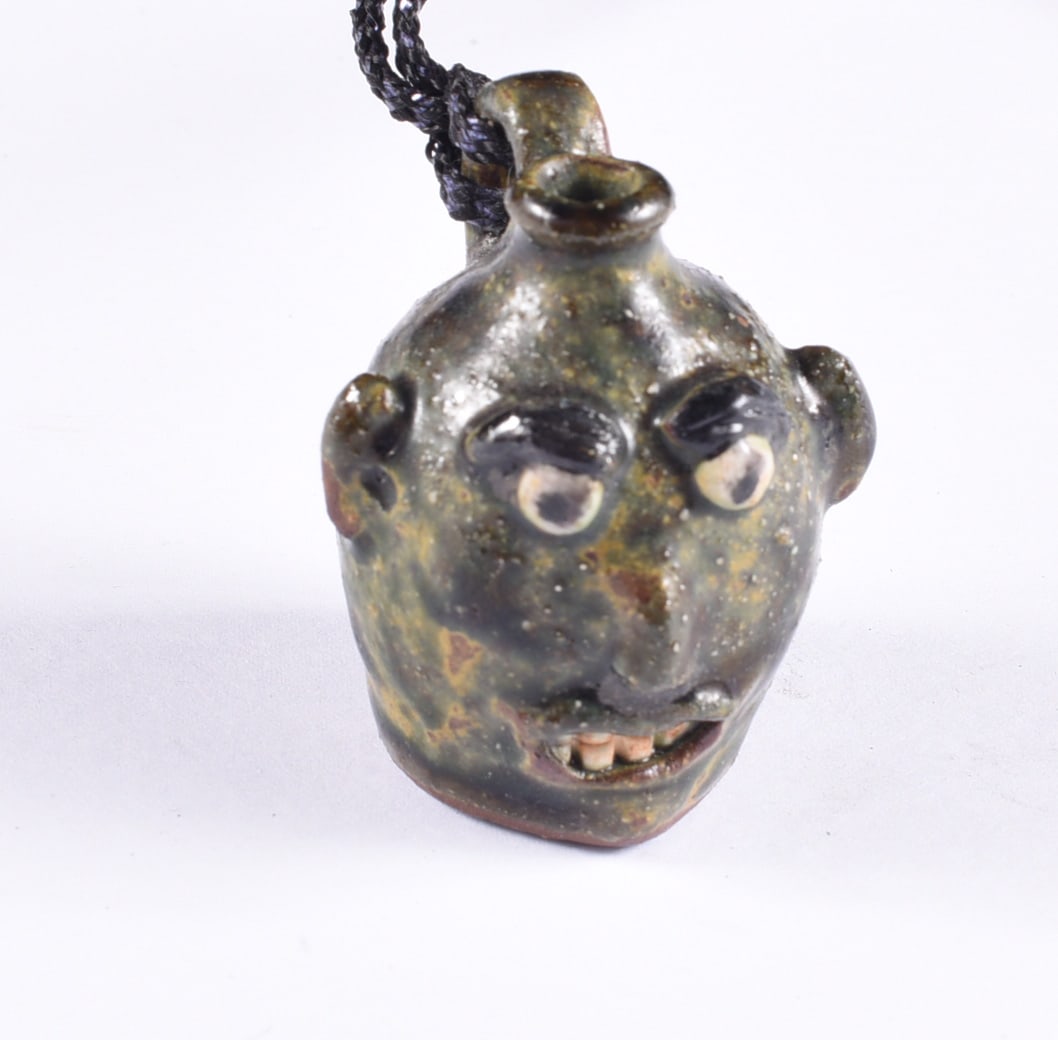Miniature Pottery Face Jug Necklace (1 of 2)