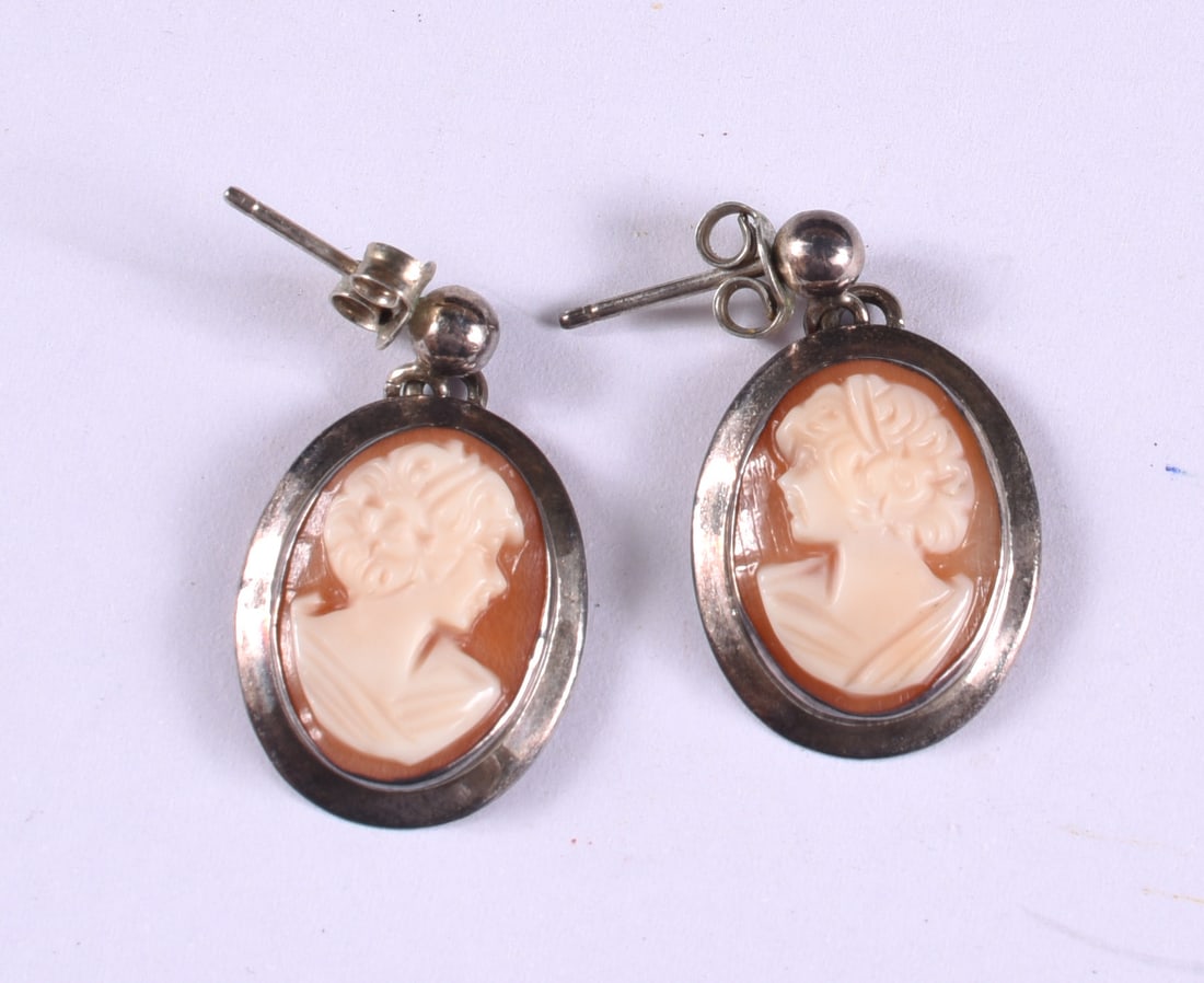 Shell Cameo Earings: This is a collection of jewelry from two estates. All items are sold as is where is. We can in house ship and our price is below under condition. The price to the right is 3rd party shipping. To get i