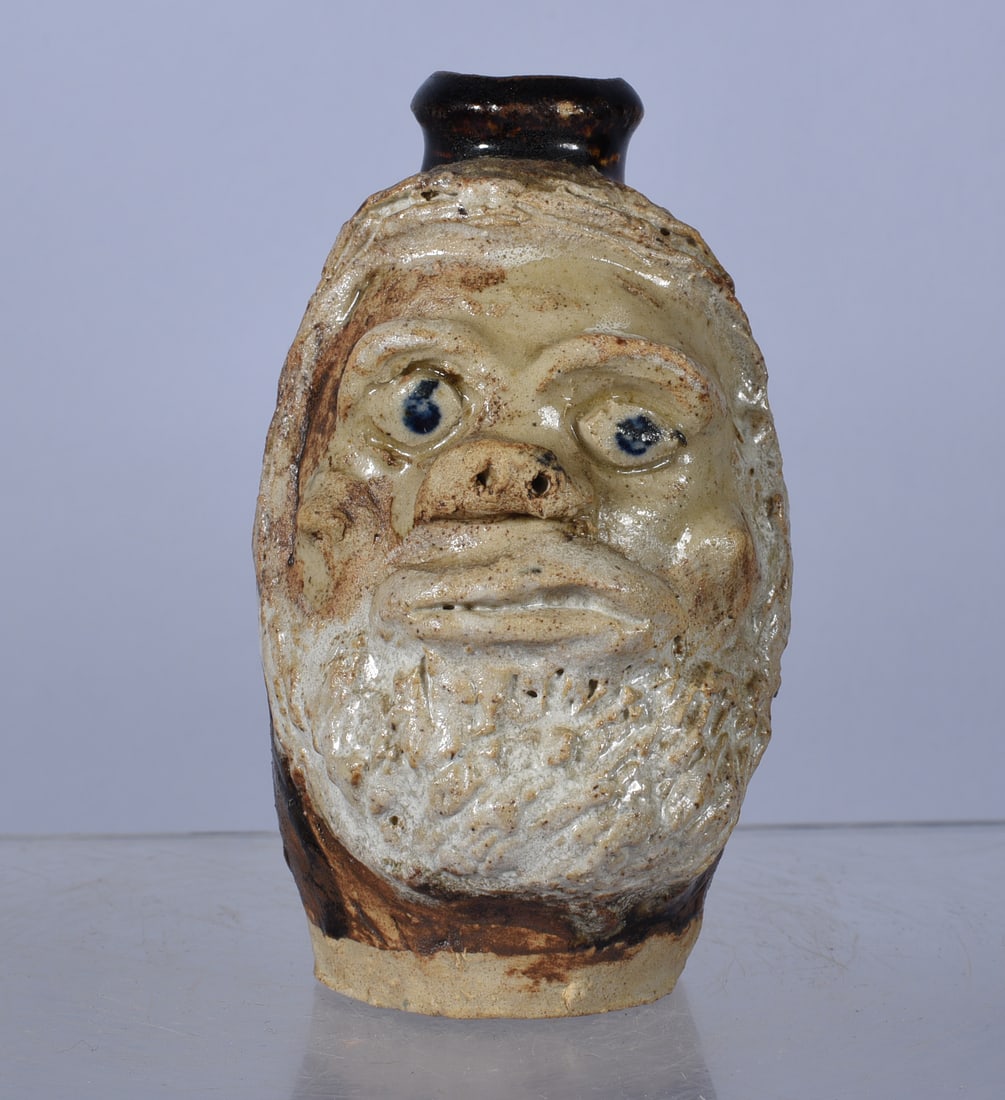 Marie Rogers Miniature Face Jug: miniature face jug by Marie Rogers. Signed. All items can be shipped in house see price under condition. The price to right is 3rd party and has nothing to do with us. To get in house shipping select 