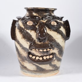 Ed Lane Swirl Face Jug Churn