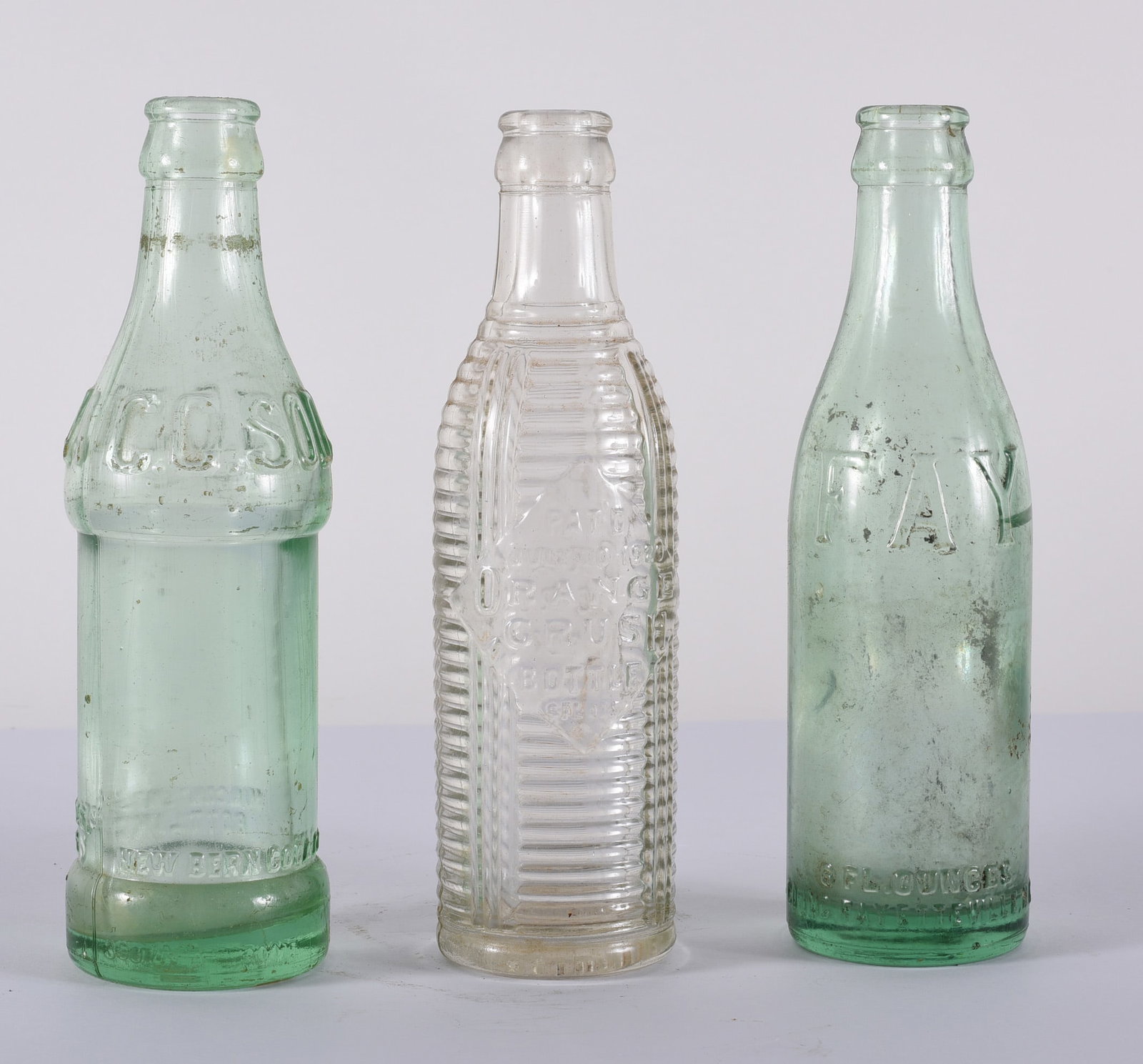 Three Vintage Soda Bottles: READ IN FULL! These items are all from an attic that we cleaned out. These are sold as is where is. See pictures for details. If we in house pack and ship for you it takes 4 weeks or so DO NOT ASK WHE