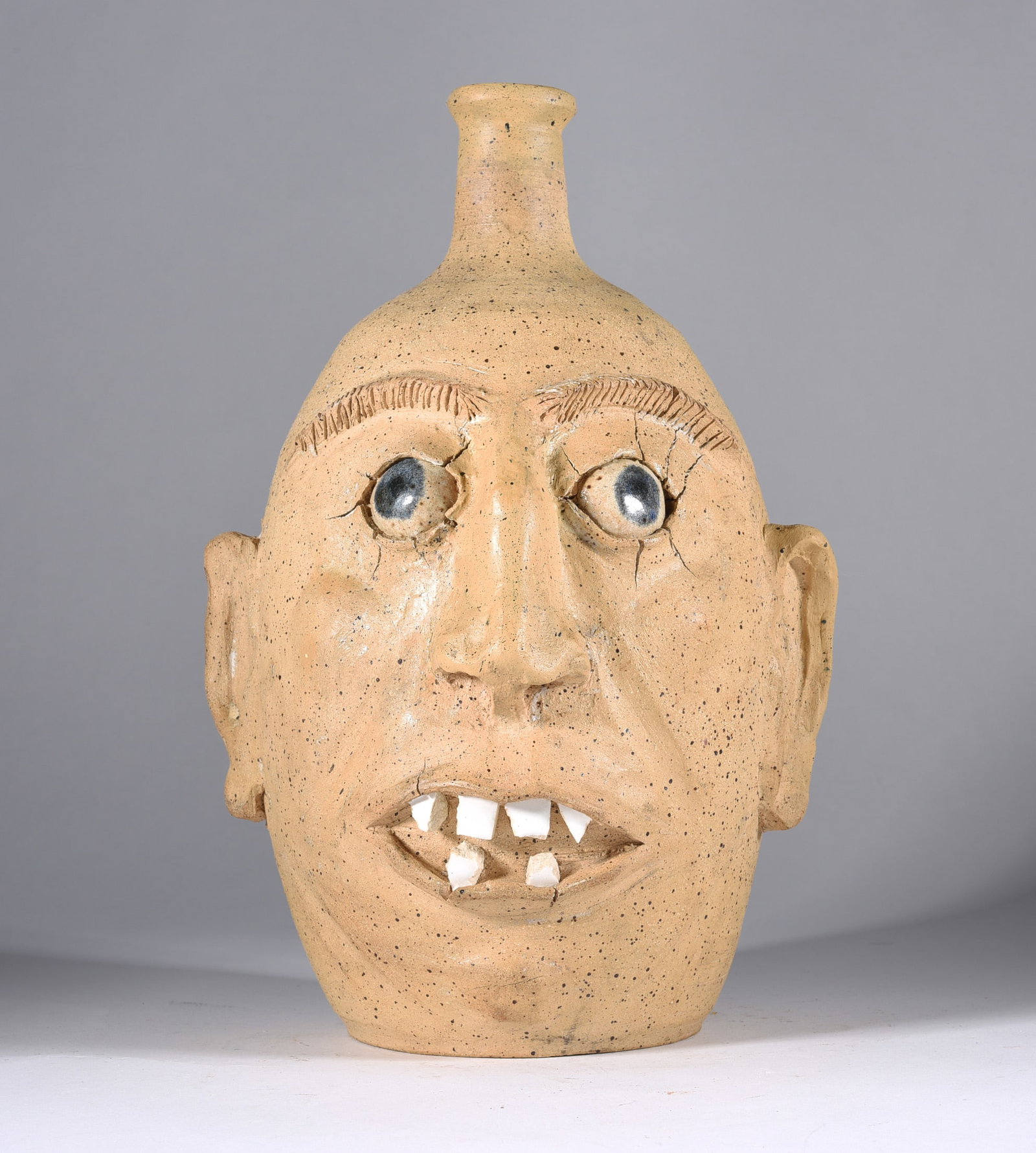 North Carolina Pottery Face Jug: All pottery is from a single owner collection and is in as fired condition unless otherwise stated under condition. See photos for details. IN HOUSE SHIPPING is also listed under Condition.