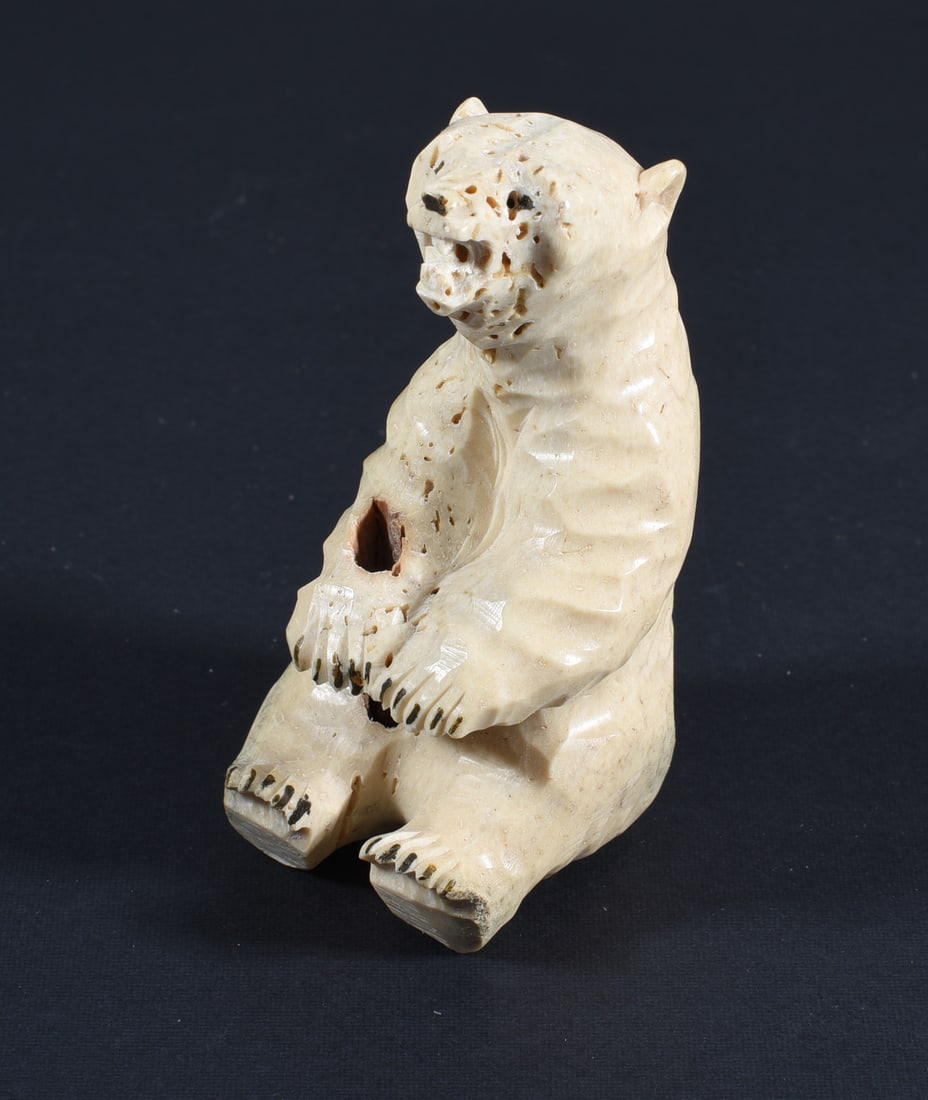 Inuit Carved Whale Bone Seated Bear: Copy Paste this link for youtube video of sizeshttps://youtube.com/shorts/bcUcOVJRQCY?feature=shareThese bone carvings were found in an attic trunk wrapped in 1960s newspaper. The collection came stra