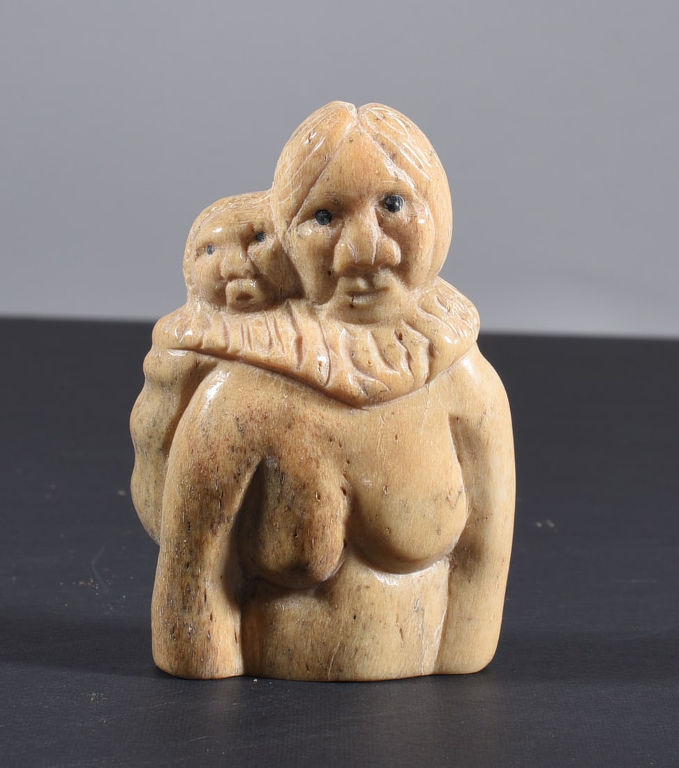 Inuit Carved Whale Bone Eskimo Family: These bone carvings were found in an attic trunk wrapped in 1960s newspaper. The collection came straight from the attic to our gallery and we unwrapped and photoed. All of these are small under 7". W